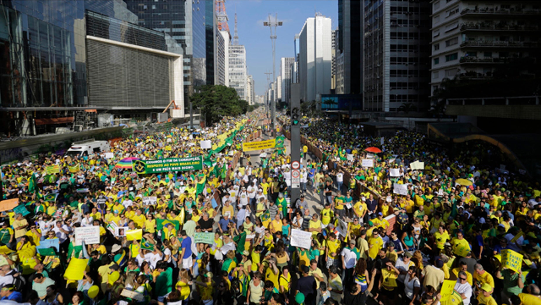 April 12, 2015: Demonstrators take part in an anti-government protest in Sao Paulo, Brazil. Anti-government demonstrators streamed into the streets throughout Brazil to demand the impeachment of President Dilma Rousseff. (AP Photo/Nelson Antoine)