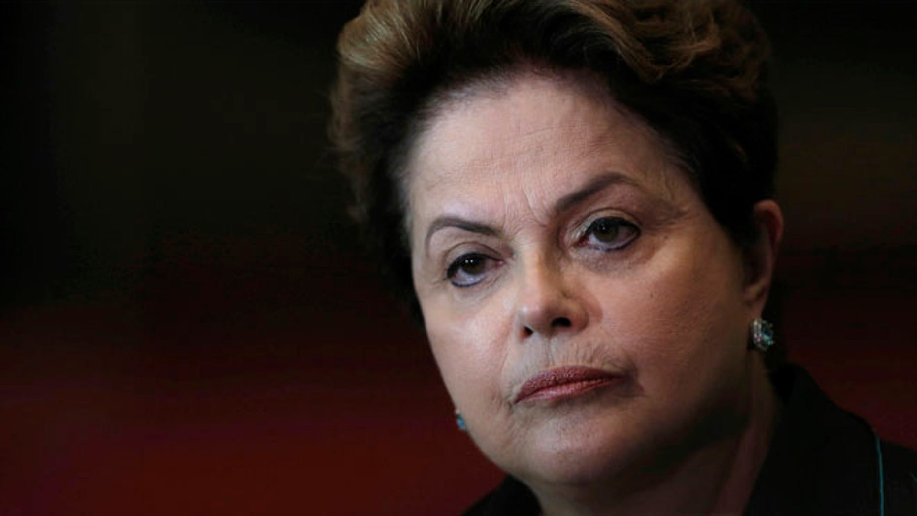 FILE - In this Oct. 6, 2014 file photo, Brazil's President Dilma Rousseff listens to a question during a re-election campaign news conference at the Alvorada Palace in Brasilia, Brazil. Just days after the Rio Olympics ended, Brazilian senators are now gearing up for a final decision on whether to permanently remove President Dilma Rousseff from office. The months-long leadership fight has brought to the surface deep polarization in Latin America's most populous nation, fueled by anger over endemic corruption and angst about an emerging economy that has gone from darling to depression amid its worst financial crisis in decades. (AP Photo/Eraldo Peres, File)