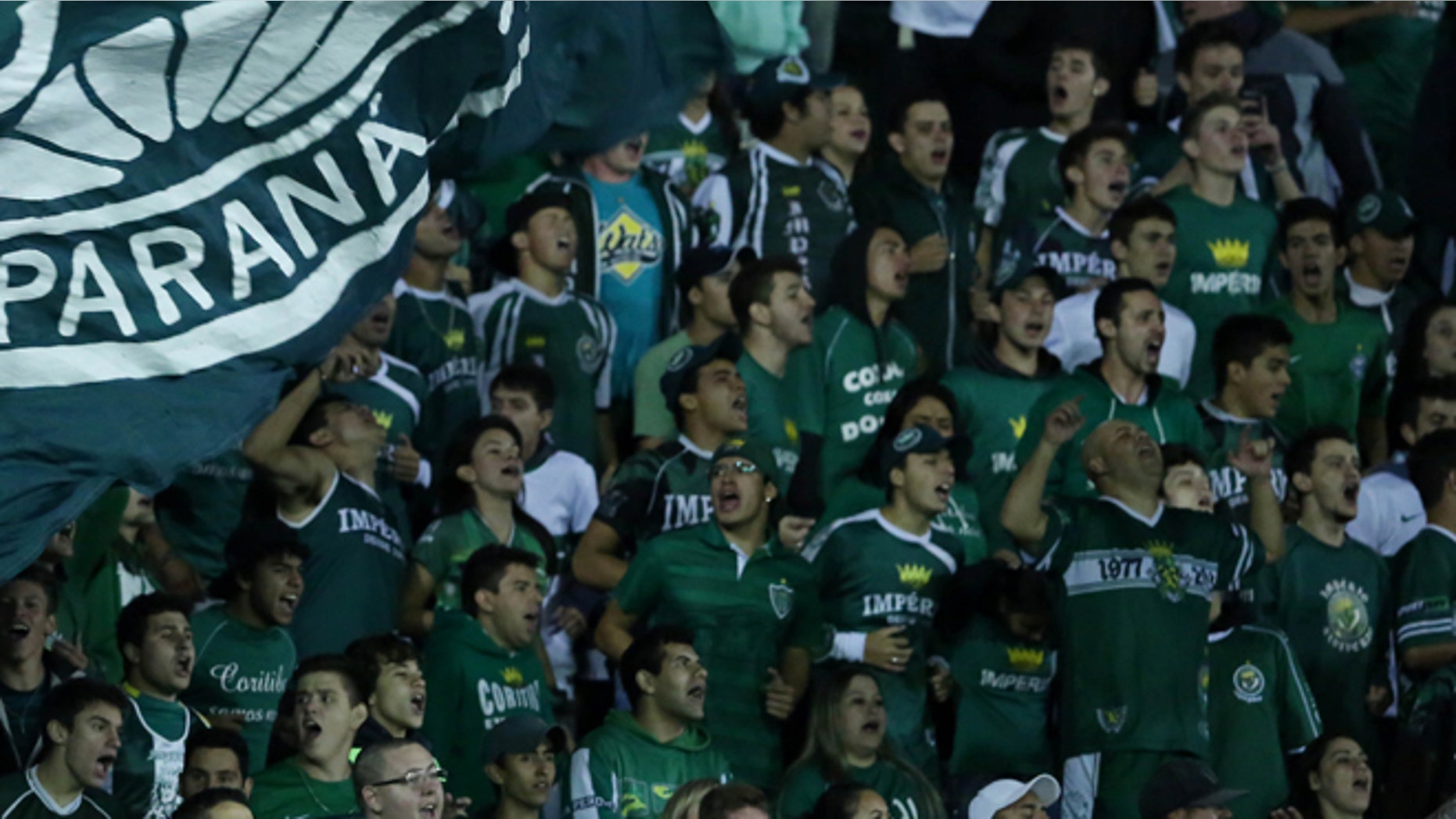 CORITIBA, BRAZIL - APRIL 26: Fans of Coritiba during the match between Coritiba and Santos for the Brazilian Series A 2014 at Couto Pereira stadium on April 26, 2014 in Coritiba, Brazil. (Photo by Heuler Andrey/Getty Images)