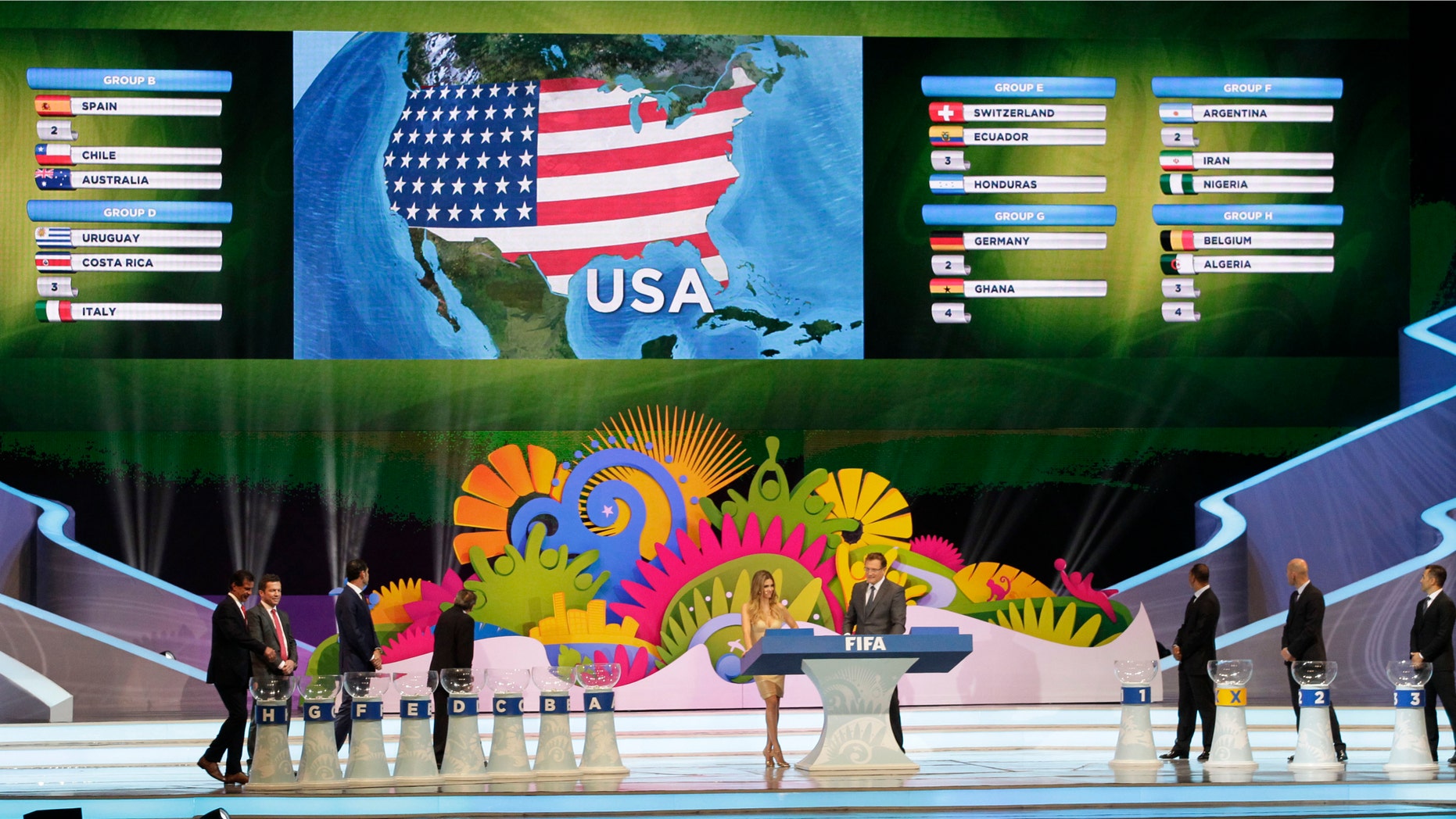 The lot of the United States is drawn during the draw ceremony for the 2014 soccer World Cup in Costa do Sauipe near Salvador, Brazil, Friday, Dec. 6, 2013. (AP Photo/Silvia Izquierdo)