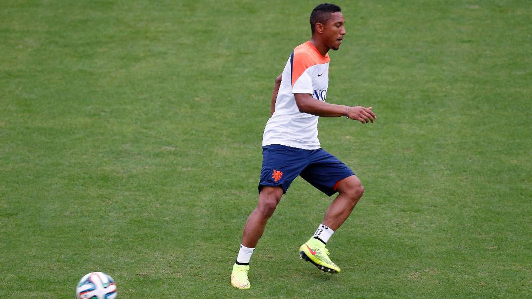 In this June 10, photo, Jonathan de Guzman of the Netherlands is seen during a training session in Rio de Janeiro, Brazil. Jonathan de Guzman appears to have fully recovered from a hamstring strain and to be fit enough to play in the Netherlands' crucial Group B opener against defending champion Spain of Friday. (AP Photo/Wong Maye-E)
