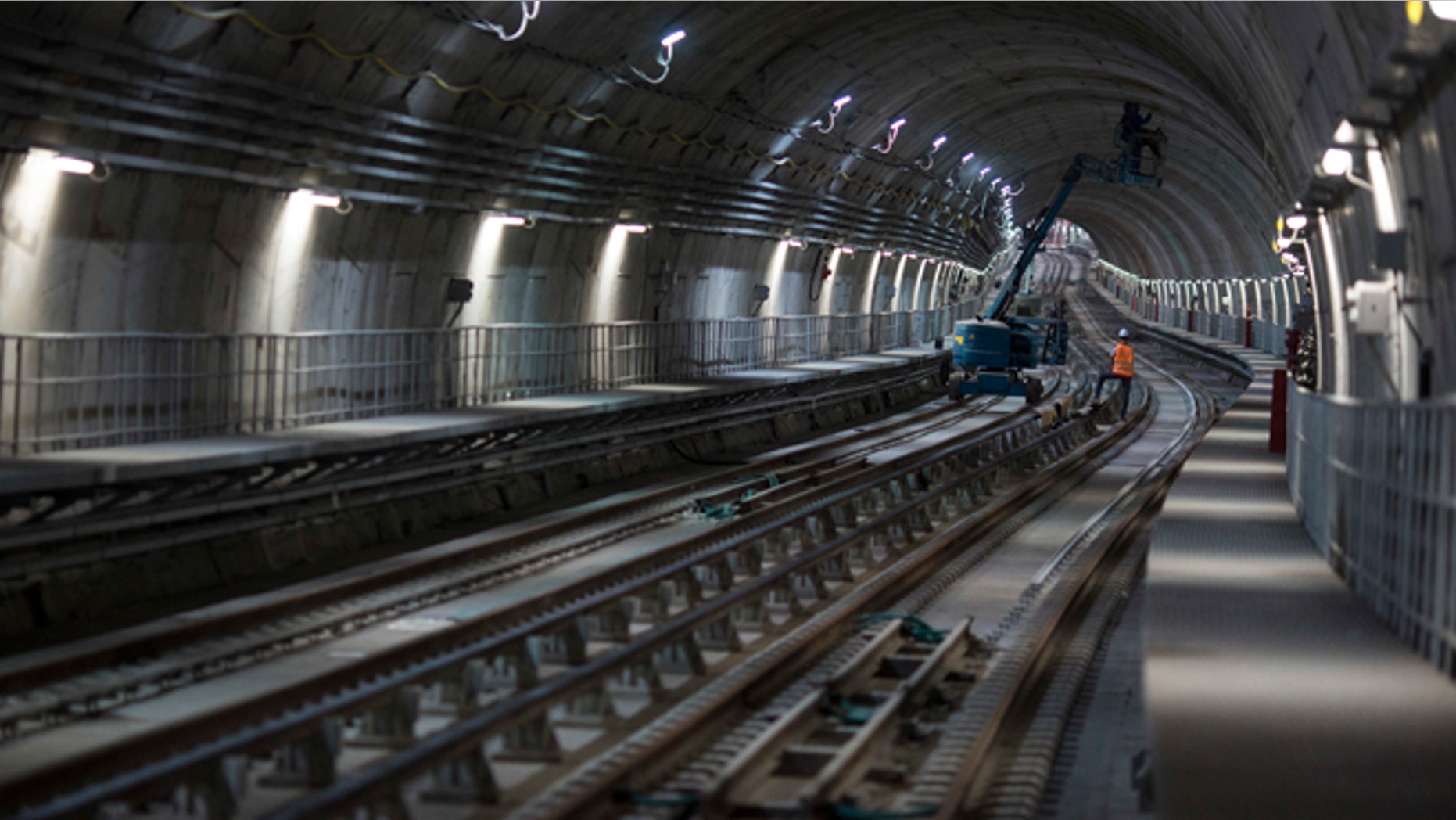 Men work in the new underground subway tunnel below Ipanema neighborhood in Rio de Janeiro, Brazil.