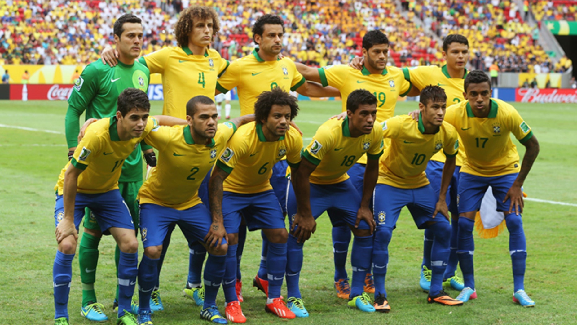 BRASILIA, BRAZIL - JUNE 15: The Brazil players line up for a team photo prior to the FIFA Confederations Cup Brazil 2013 Group A match between Brazil and Japan at National Stadium on June 15, 2013 in Brasilia, Brazil. (Photo by Scott Heavey/Getty Images)