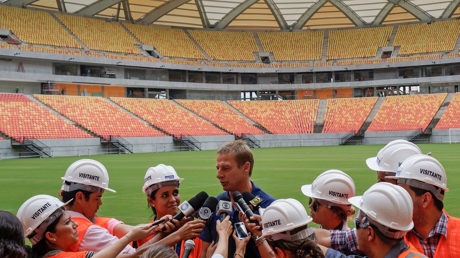 Jan. 24, 2014: Head coach of the United States soccer team, Jurgen Klinsmann, from Germany, talks with the press inside Arena da Amazonia stadium in Manaus, Brazil.