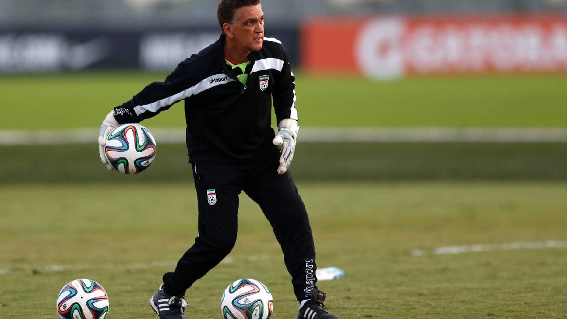 FILE - In this June 8, 2014 file photo, Iran goalkeepers coach Dan Gaspar works with goalies at the Corinthians soccer team training center in Sao Paulo, Brazil. The 58-year-old from Connecticut is at the World Cup, soccer's pinnacle. (AP Photo/Julio Cortez, File)