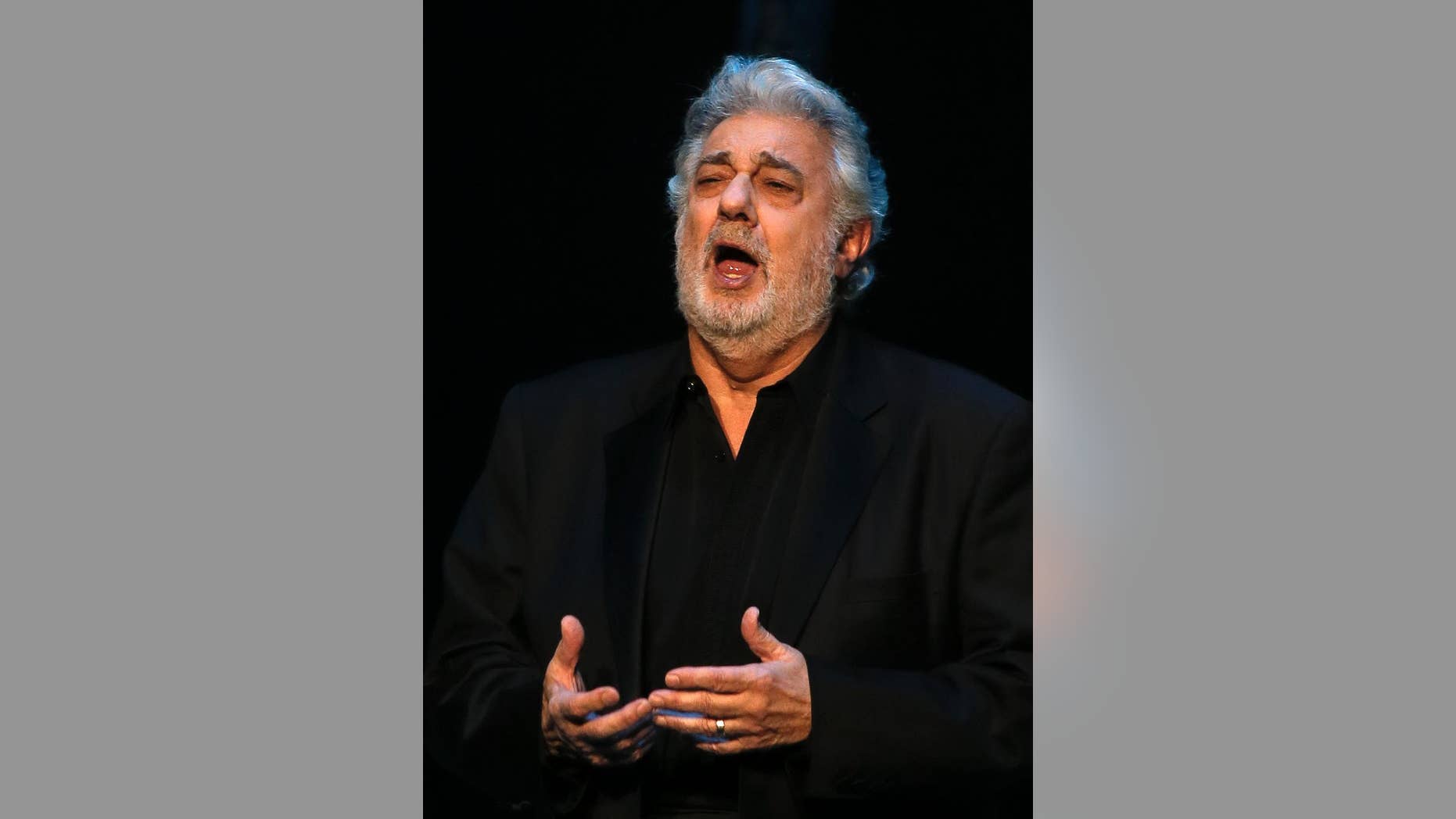 FILE - In this May 1, 2013 file photo, Placido Domingo performs Siegmund's aria in "The Valkyrie," during a pre-premiere performance, in St. Petersburg, Russia. The Spanish tenor has given a concert during nearly every single World Cup since 1990 and is gearing up for a July 11, 2014 presentation in Rio de Janeiro, just two days before the city hosts the final game. (AP Photo/Dmitry Lovetsky, File)