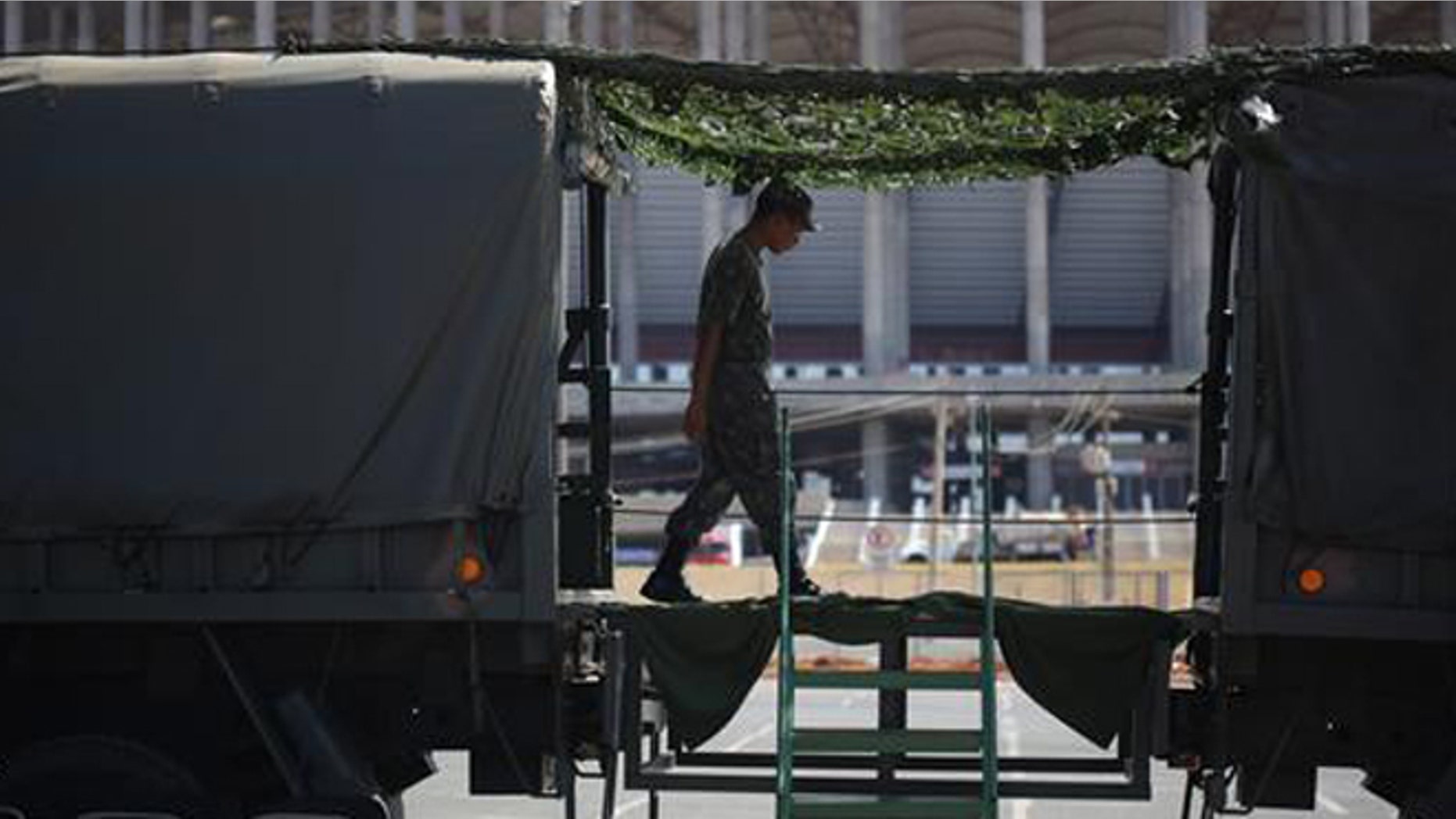 A Brazilian Army soldier in front of the National Stadium in Brasilia, Brazil, Thursday, July 21, 2016.