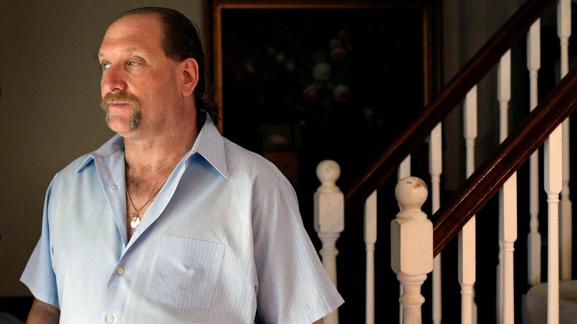 Breast cancer survivor Robert Kaitz thought a small growth under his left nipple was just a harmless cyst. The diagnosis was a shock. (AP Photo/Patrick Semansky)