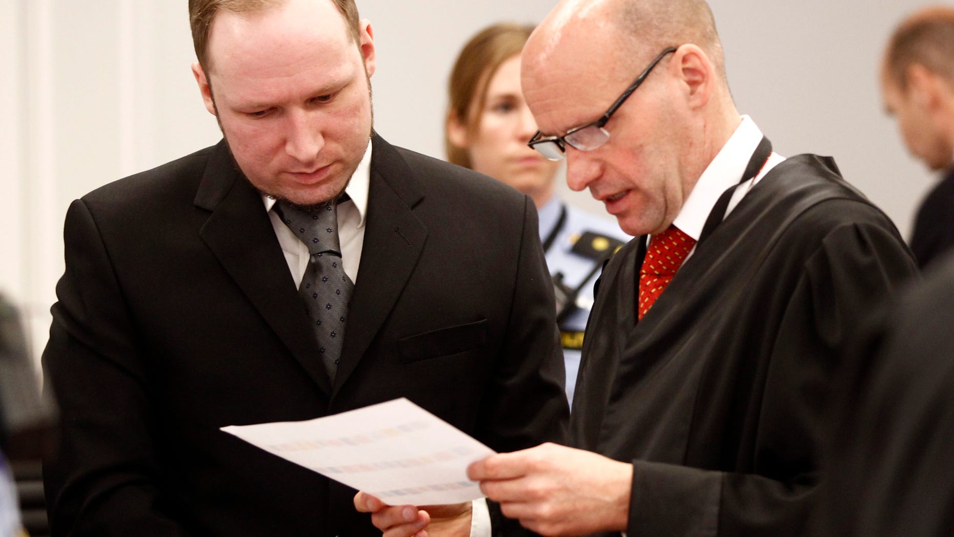 April 23: Anders Behring Breivik (left), and his defence lawyer Geir Lippestad during the morning break on day 6 of the trial in Oslo.