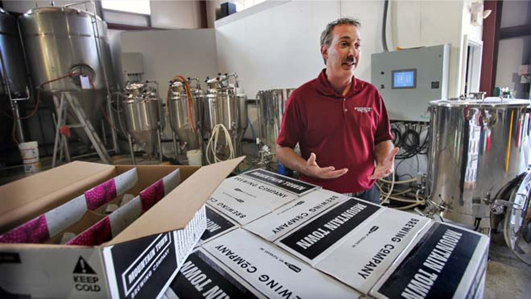 This photo released by Central Michigan University in Mount Pleasant, Mich., shows James Holton, owner of Mountain Town Station Brewing Co. & Restaurant. (AP/Steve Jessmore, Central Michigan University).