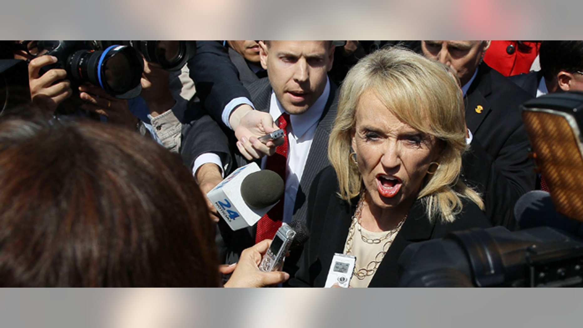 WASHINGTON, DC - APRIL 25: Arizona Gov. Jan Brewer speaks to the media after arguments at the U.S. Supreme Court, on April 25, 2012 in Washington, DC. This morning the high court will heard arguments on Arizona v. United States and will be tasked with deciding the conflicting roles of national and state governments in controlling the lives of noncitizens living illegally in the U.S.while deciding the constitutionality of Arizona's immigration law SB 1070. (Photo by Mark Wilson/Getty Images)