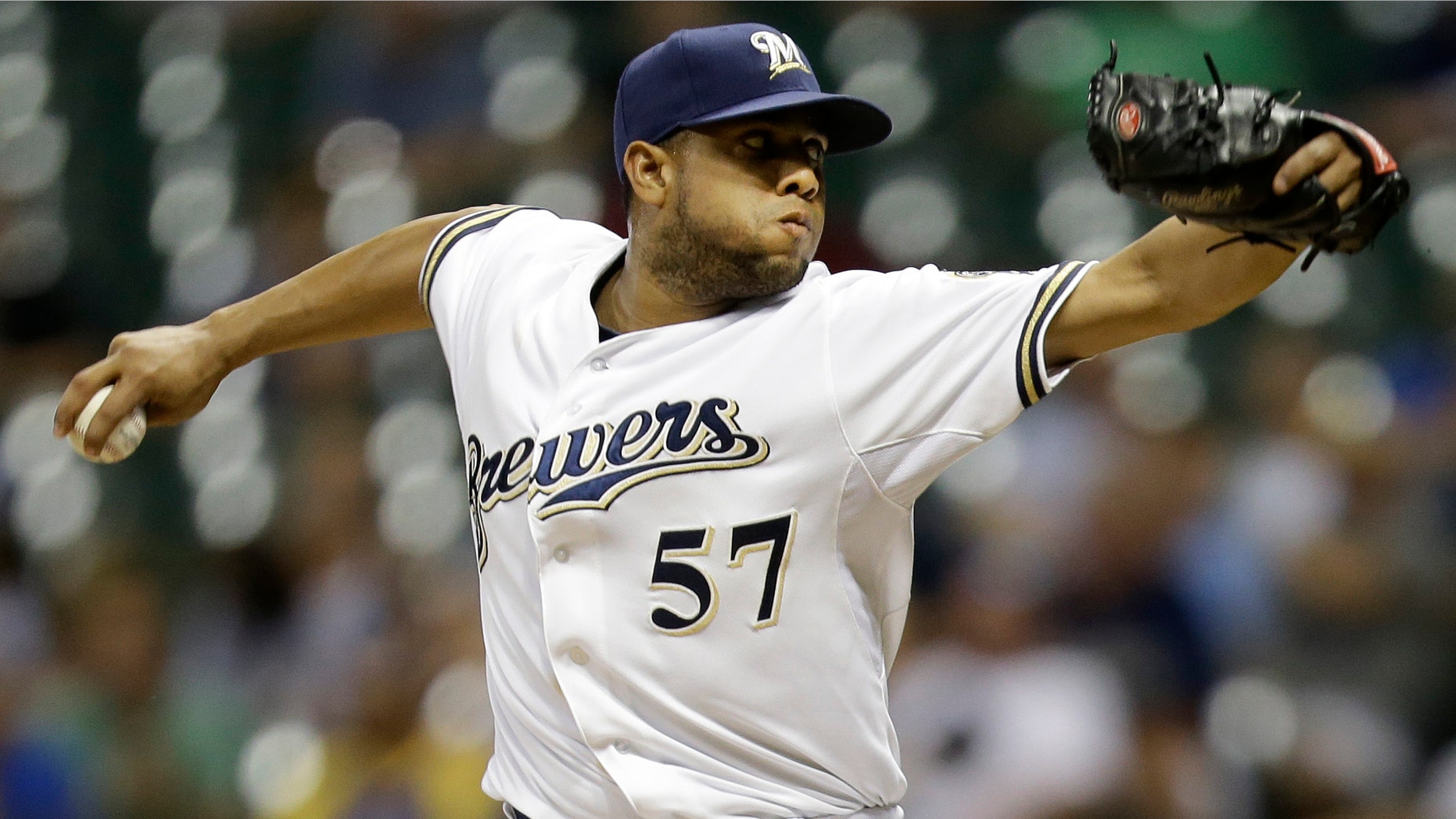 MILWAUKEE, WI - JULY 18: Francisco Rodriguez #57 of the Milwaukee Brewers pitches in the top of the ninth inning against the Miami Marlins at Miller Park on July 18, 2013 in Milwaukee, Wisconsin. (Photo by Mike McGinnis/Getty Images)