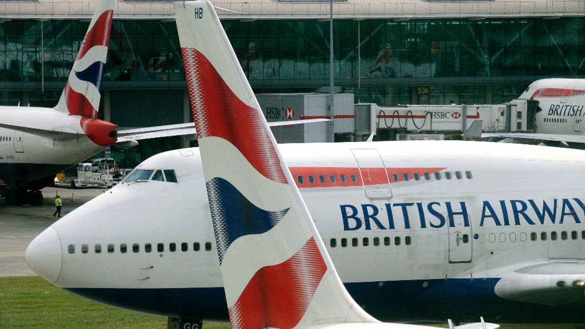 FILE - In this Sunday, Aug. 2, 2009 file photo, a British Airways Boeing 747 taxis away from Terminal 5 at London's Heathrow Airport. Britain’s Airports Commission unanimously recommended the construction of a third runway at London’s Heathrow Airport on Wednesday, July 1, 2015, in a long-awaited report on how to best expand the country’s aviation capacity. The commission decided that Heathrow presented a stronger case for the British economy than rival Gatwick. But it stressed that Europe’s largest airport needs to address air quality, noise and community concerns.(AP Photo/Mark Lennihan, file)