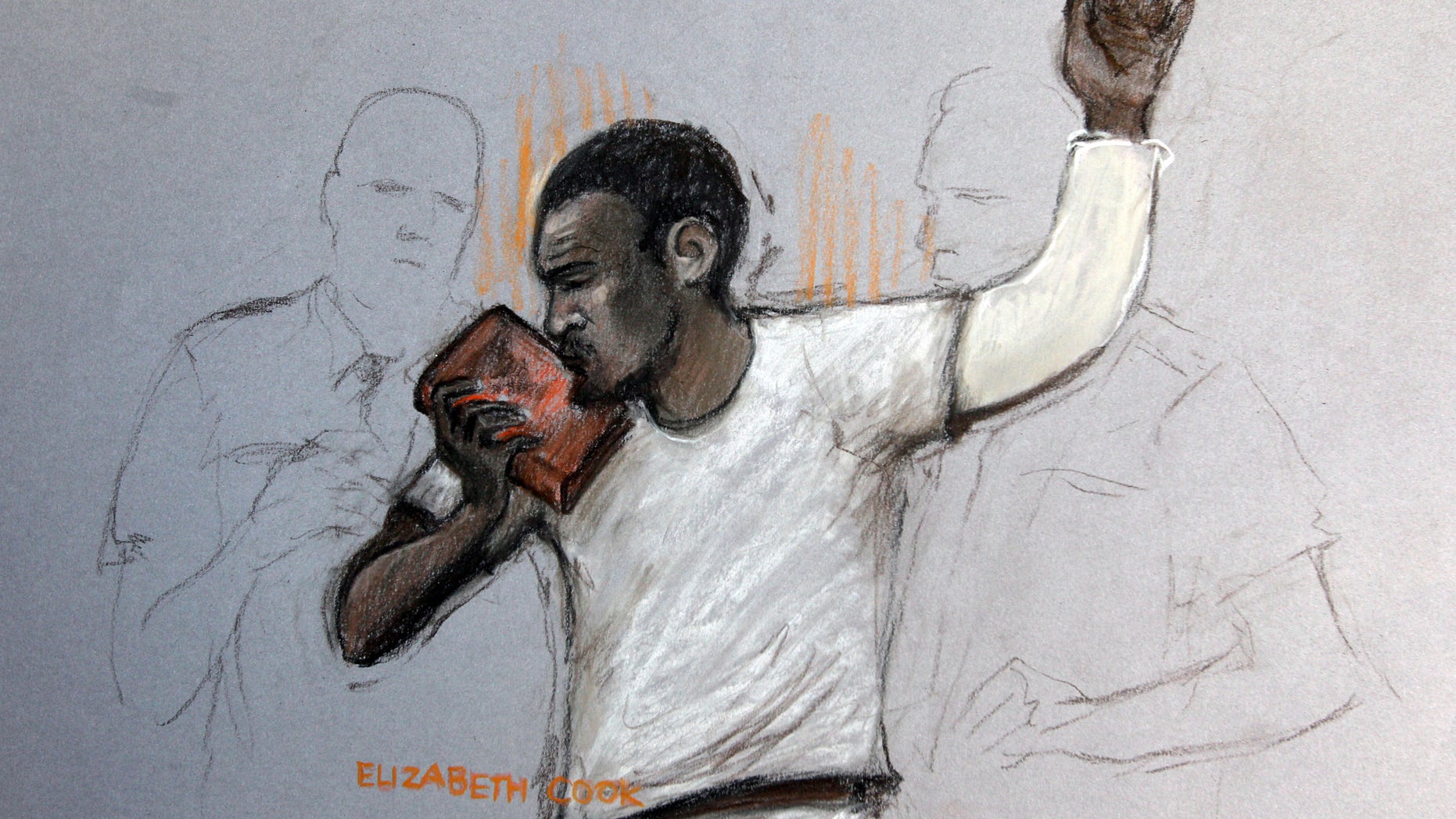 June 3, 2013 - In this court artist sketch by Elizabeth Cook, suspect Michael Adebolajo kisses the Koran, as he appears at Westminster Magistrates Court, London.