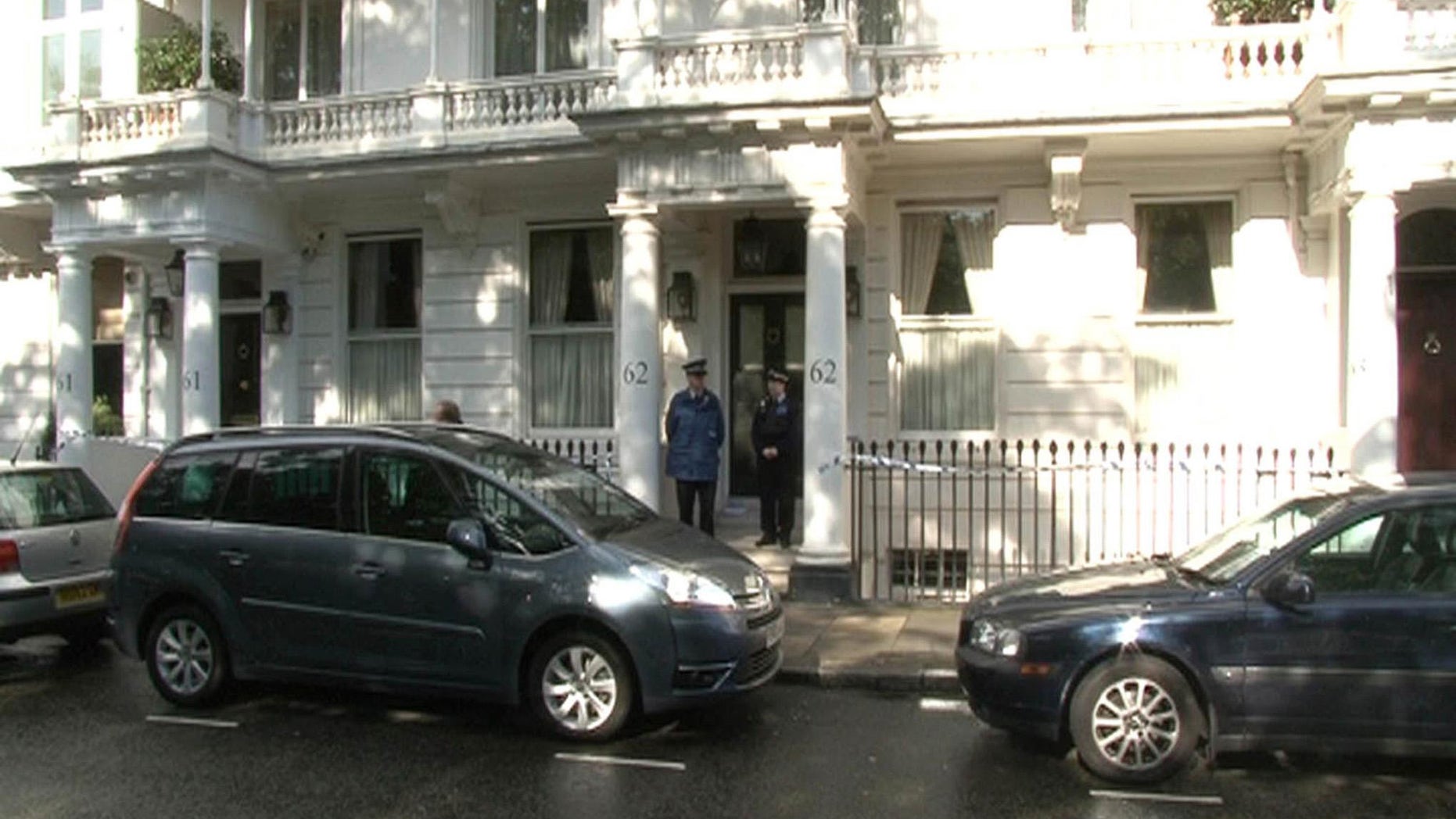 July 10, 2012: Police outside a house in Cadogan Place, Chelsea after the body of Eva Rausing, a member of the family behind the Tetra-Pak drinks carton empire and one of the richest women in Britain was found.