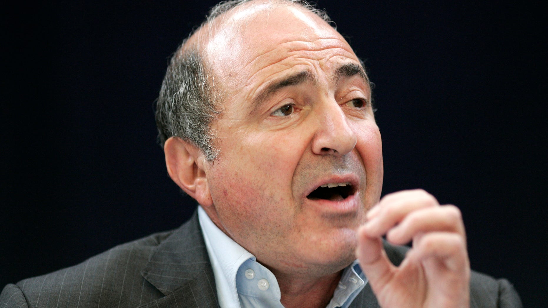 A Wednesday, July 18, 2007 photo from files showing Russian exile Boris Berezovsky, a close friend of former Russian agent Alexander Litvinenko who was poisoned by Polonium 2-10, speaking to the media in a news conference in London.