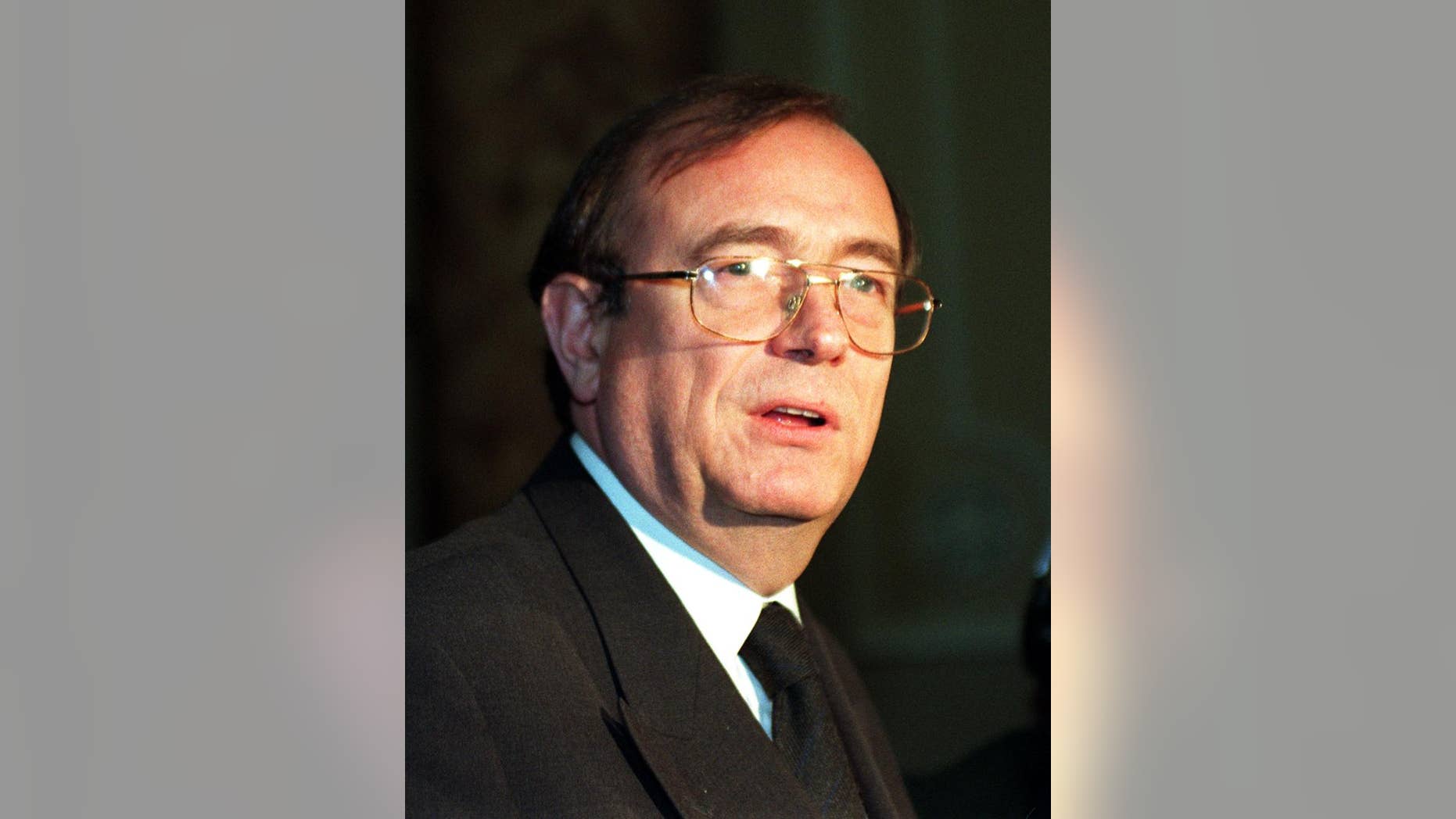 FILE - This Tuesday, Dec. 16, 1997 file photo shows the deputy speaker of the Houe of Lords John Sewel. Sewel has resigned his position after publication of photos and a video allegedly showing him using cocaine with prostitutes. Lords Speaker Baroness D'Souza Sunday called John Sewel's alleged behavior "shocking and unacceptable" and said she is calling in police to investigate on an urgent basis. The Sun on Sunday newspaper on Sunday, July 26, 2015 published photographs of him naked and appearing to snort cocaine along with snippets of his conversations with women said to be prostitutes. (Suzanne Hubbard/PA via AP, file) UNITED KINGDOM OUT - NO SALES - NO ARCHIVES