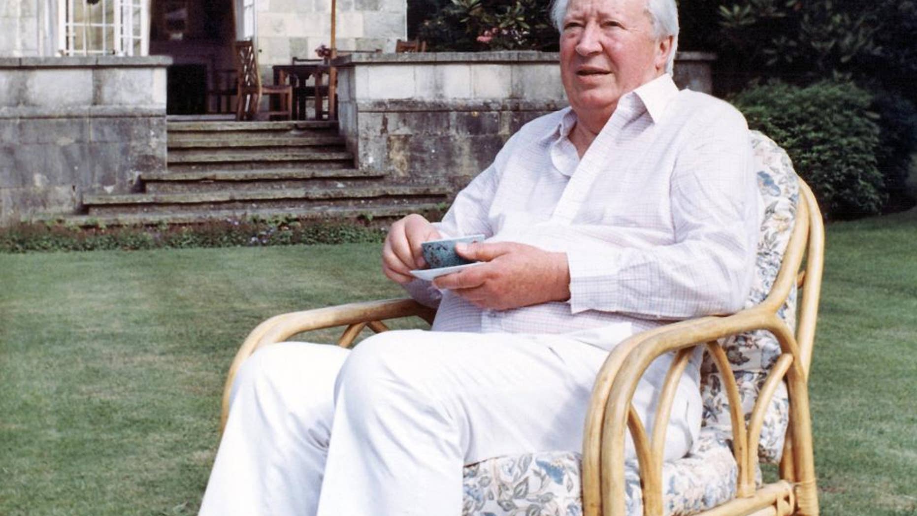 July 19, 1989 - FILE photo of former British Prime Minister Edward Heath in the garden of his home in Salisbury, England. Britain's police watchdog said it will investigate whether police failed to pursue an allegation of child sexual abuse against the late Prime Minister in the 1990s.