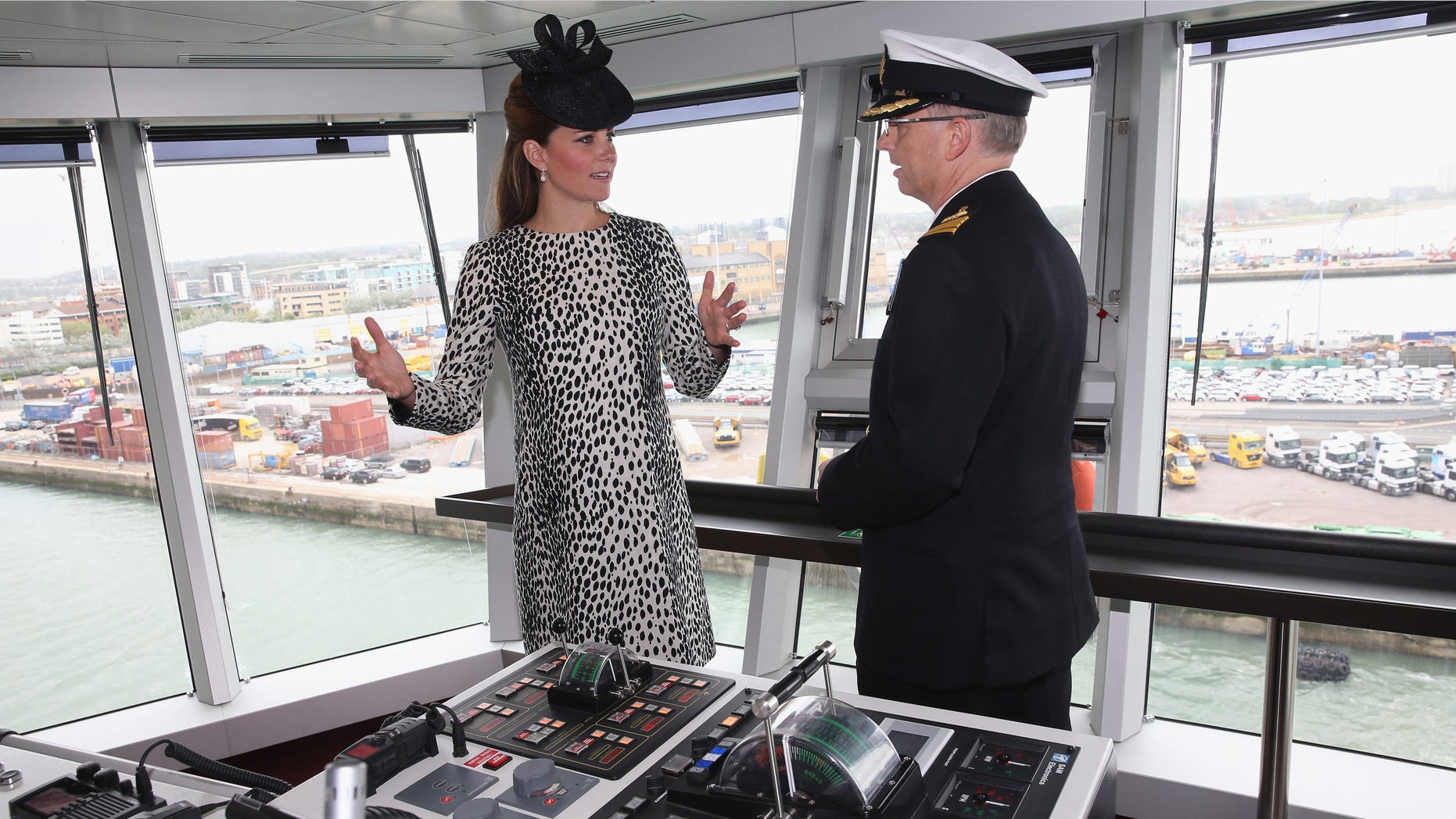 Britain's Duchess of Cambridge receives an on board tour with Captain Tony Draper during the Princess Cruises ship naming ceremony to officially name the new Royal Princess cruise liner at a gala ceremony, in Southampton, England, on Thursday.