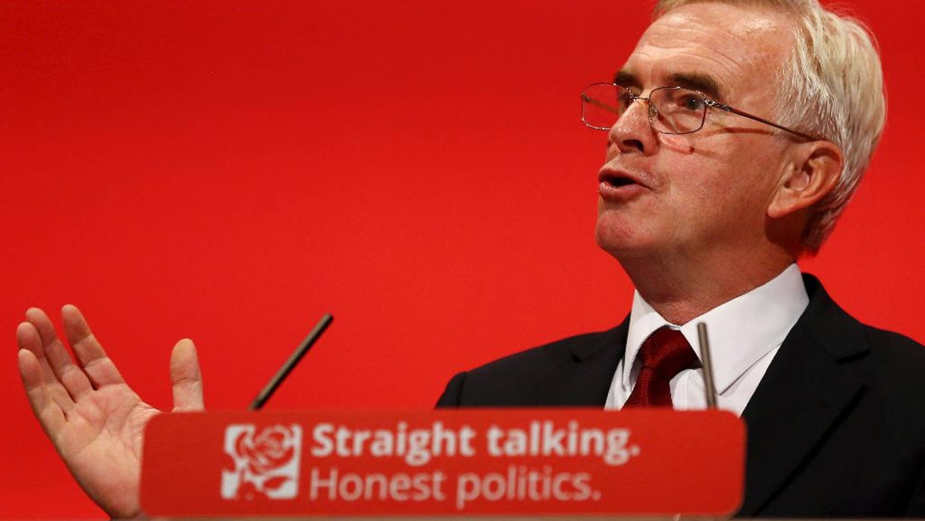 Britain's Labour Party's Shadow Chancellor of the Exchequer John McDonnell, makes his keynote speech at the Labour Party annual conference in the Brighton Centre in Brighton, England, Monday Sept. 28, 2015. McDonnell spok out strongly against the government’s austerity measures and called for increased taxation of wealthy members of society. (Gareth Fuller/PA via AP) UNITED KINGDOM OUT