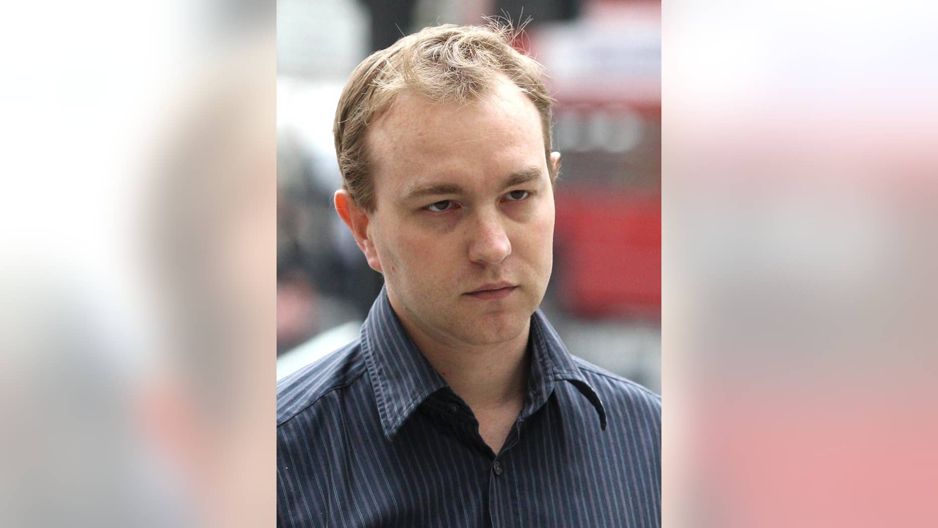 FILE - This is a June 20, 2013 file photo of former UBS and Citygroup trader Tom Hayes. A British prosecutor said Tuesday May 26, 2015 that former Citibank and UBS trader Tom Hayes who was motivated by greed served as the ringmaster of the alleged manipulation of a key interest rate, the London Interbank Lending Rate, or Libor. The charges against trader Tom Hayes, who specialized in products pegged to yen-denominated Libor, relate to the period from August 2006 to September 2010. He is charged with conspiring with employees from other leading institutions. (Lewis Whyld/PA File via AP) UNITED KINGDOM OUT