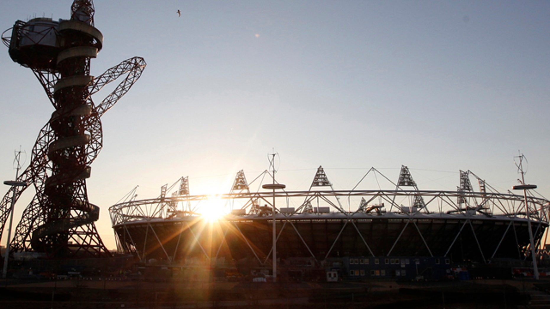Feb. 23, 2012: In this file photo the London 2012 Olympic Stadium is seen at about sunset, with the partially completed ArcelorMittal Orbit at the Olympic Park in London.