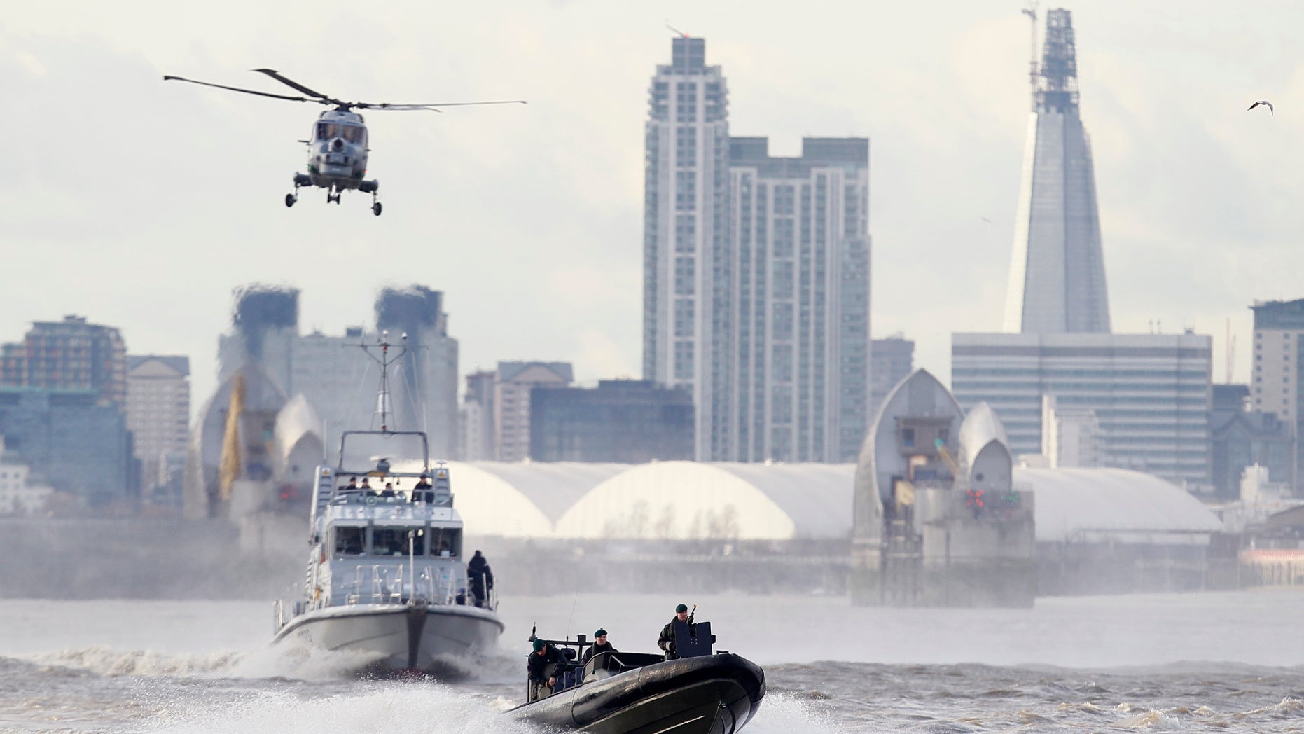 Jan 19. 2012: In this file photo security forces take part during in a combined British police and British Royal Marines security exercise for the London 2012 Olympic Games on the River Thames in London.