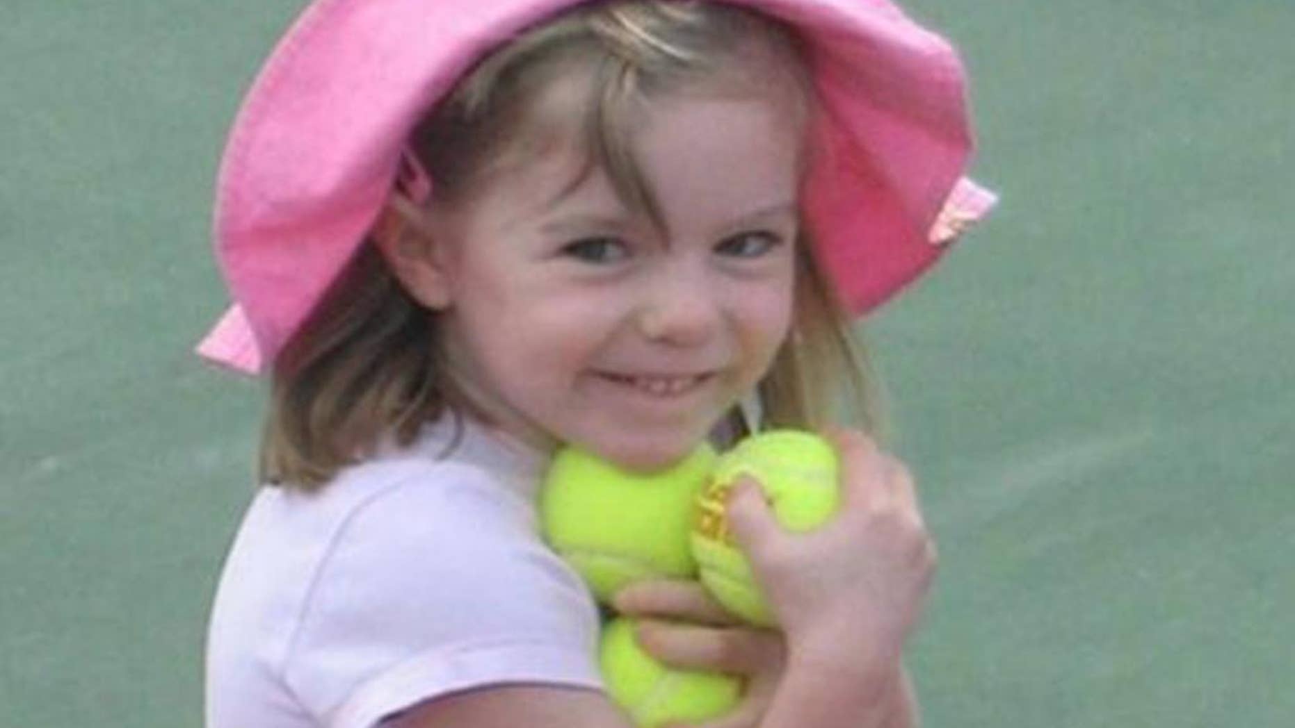 FILE - This undated file photo made available by the London Metropolitan Police, shows missing British girl Madeleine McCann before she went missing from a Portuguese holiday complex . British police investigating the disappearance of Madeleine McCann said Wednesday March 19, 2014, they are seeking an intruder who sexually assaulted five girls in the region of southern Portugal where the British toddler was last seen. (AP Photo/London Metropolitan Police)