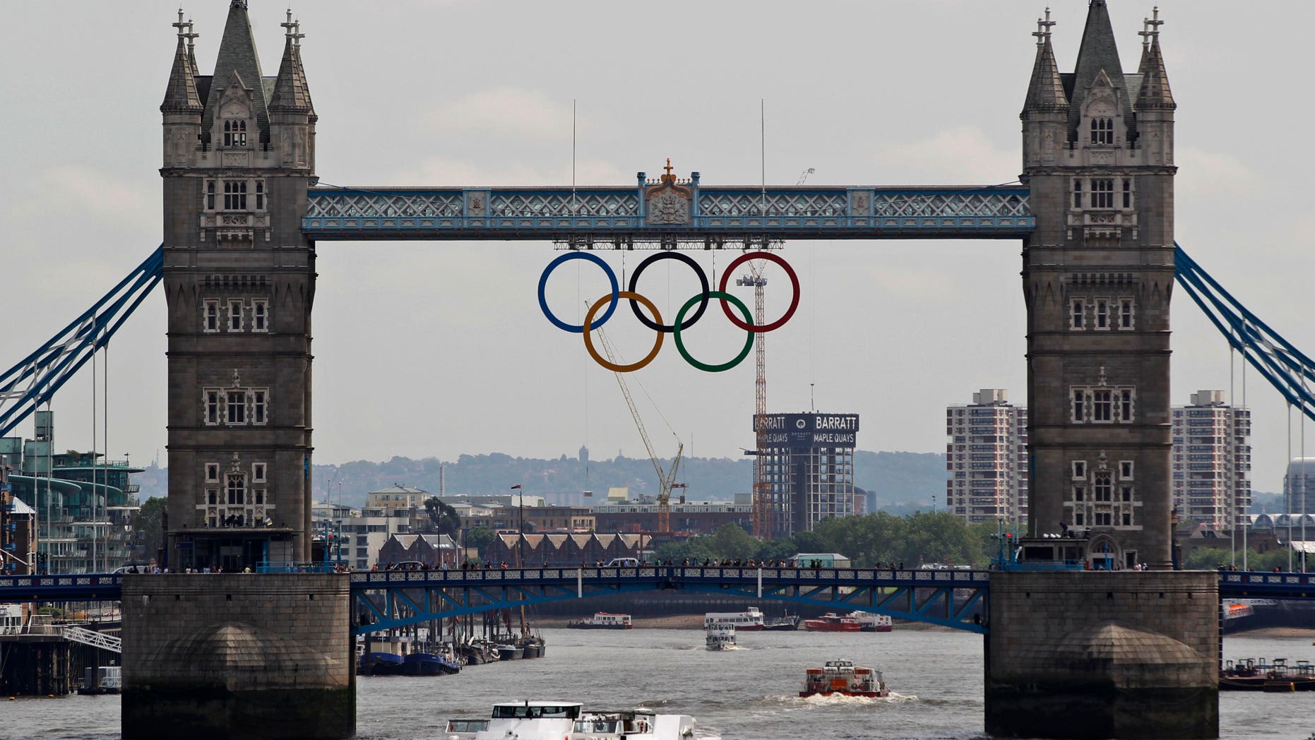 June 27, 2012:This file photo shows the Olympic rings atop the iconic Tower Bridge over the river Thames in London, with one month to go until the start of London 2012 Games.