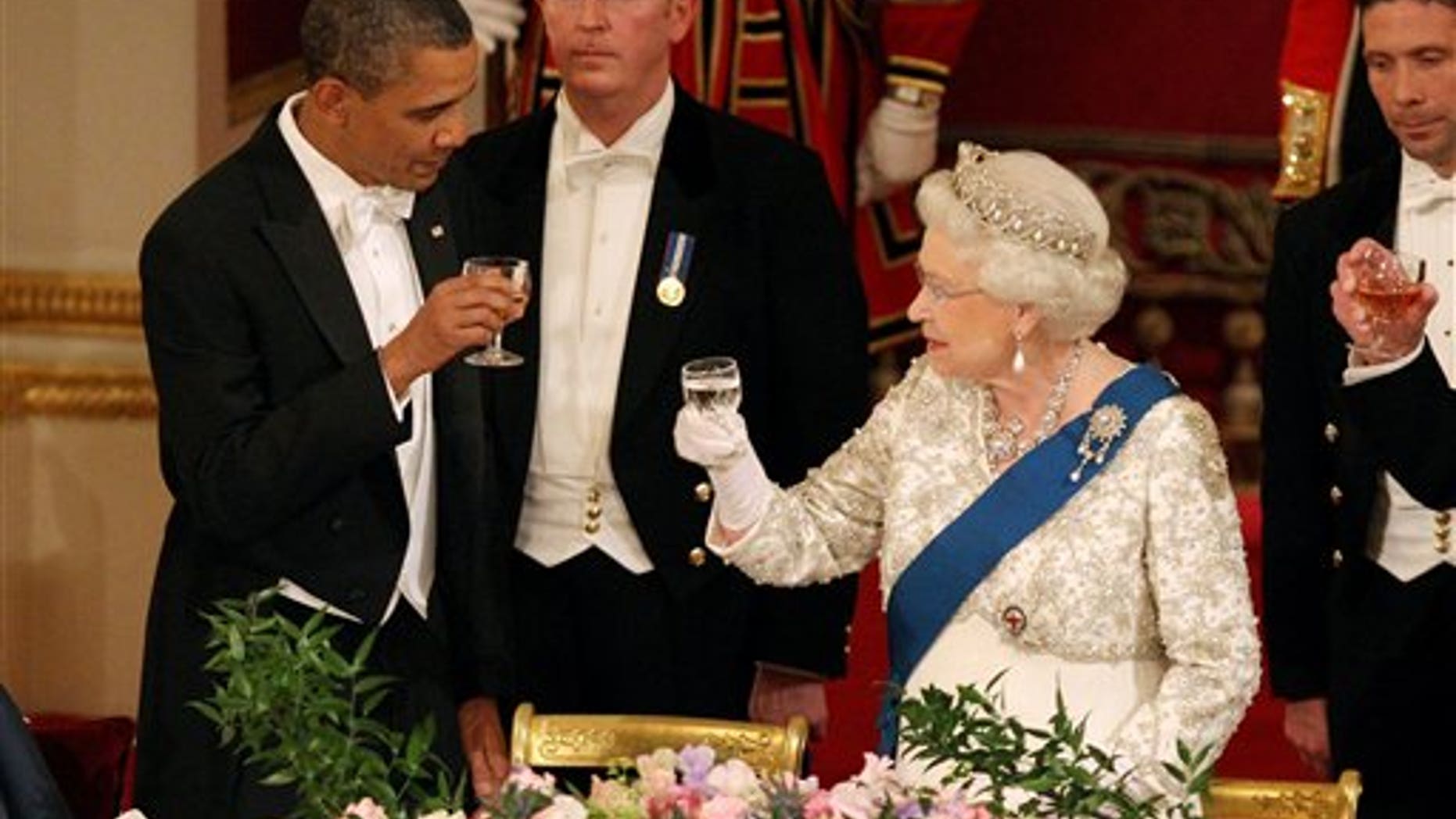 May 24: Britain's Queen Elizabeth II, and U.S. President Barack Obama during a state banquet in Buckingham Palace, London. President Barack Obama immersed himself in the grandeur of Britain's royal family Tuesday, as Queen Elizabeth II welcomed him to Buckingham Palace for the first day of a state visit. (AP/Pool)