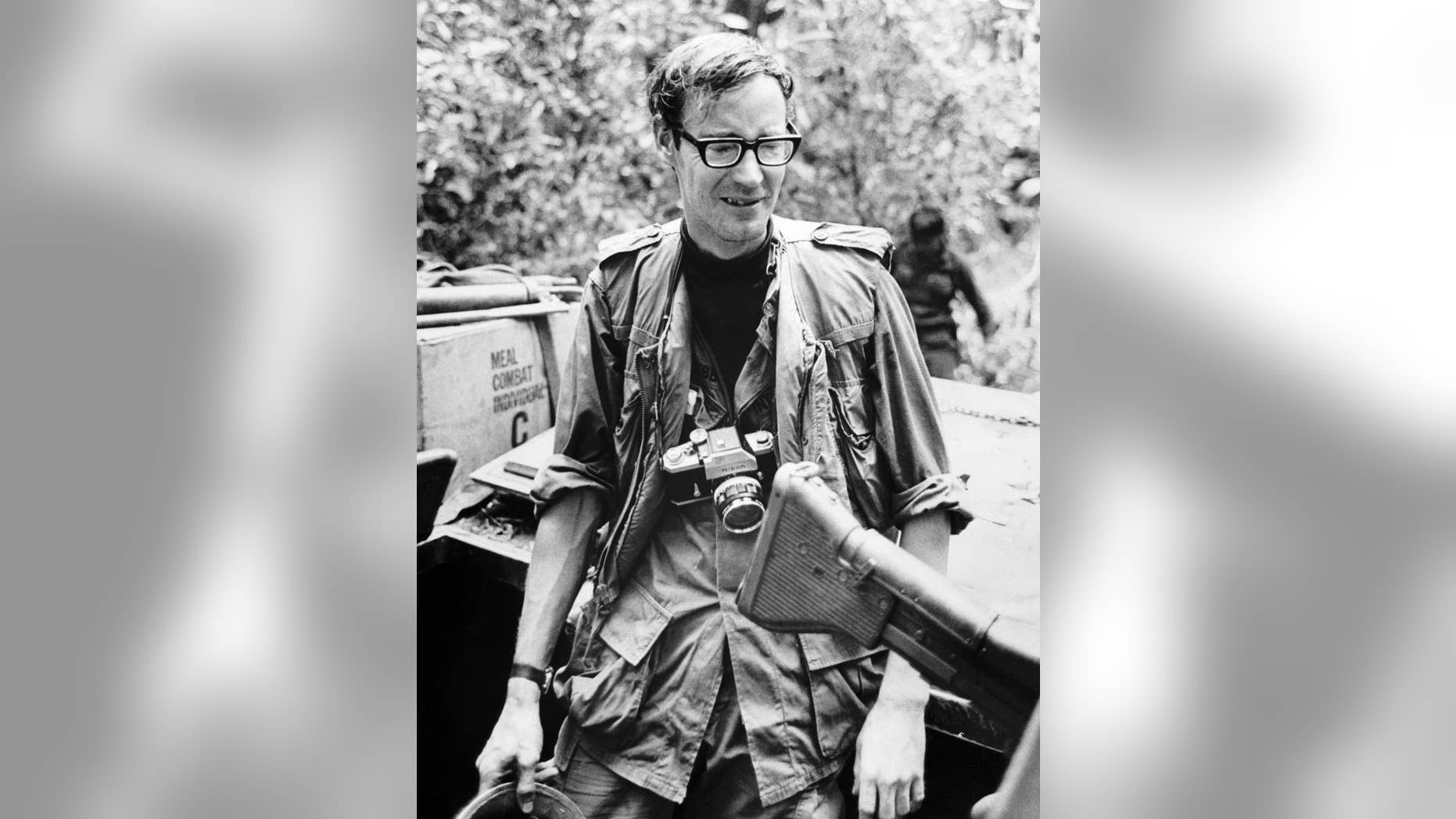 This is a December 1967, image taken in Vietnam of veteran newsman Al Webb, made available by Corbis on Tuesday Feb 3, 2015. Al Webb has died in England after a long career in which he received a military medal for valor while covering the war in Vietnam. He was 79. His wife Elizabeth Webb said Tuesday Feb. 3, 2015 that he died Jan. 25 at a hospital in Banbury, 75 miles (120 kilometers) northwest of London from complications from pneumonia and diabetes. (AP Photo/CORBIS) NO ACHIVE
