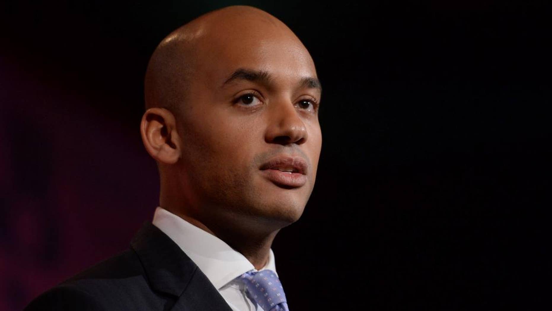 FILE - This Tuesday, Feb. 10, 2015 file photo shows Britain's Shadow business secretary Chuka Umunna delivering a speech in London. An up-and-coming British politician who was considered a front-runner to replace Labour leader Ed Miliband abruptly withdrew from the contest Friday, May 15, 2015, saying he had underestimated the intense scrutiny to which he would be subjected. Chuka Umunna, who announced his leadership bid just three days ago, blamed the "added level of pressure that comes with being a leadership candidate.” (Anthony Devlin/Pa via AP, file) UNITED KINGDOM OUT - NO SALES - NO ARCHIVES
