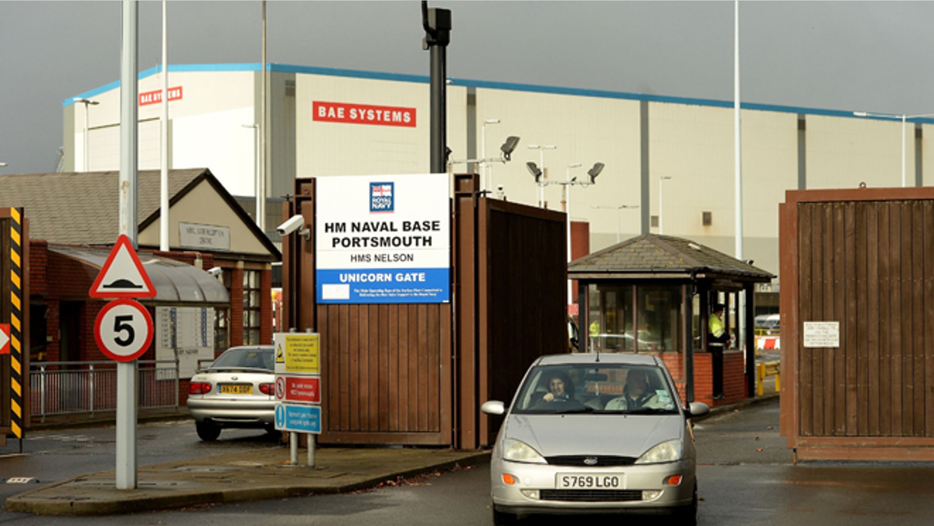 A general view of Unicorn Gate at HMS Nelson Portsmouth, England, Wednesday, Nov. 6, 2013, home to BAE Systems who are to axe jobs across its naval ships business and end shipbuilding at one of the country's most historic yards, in Portsmouth.