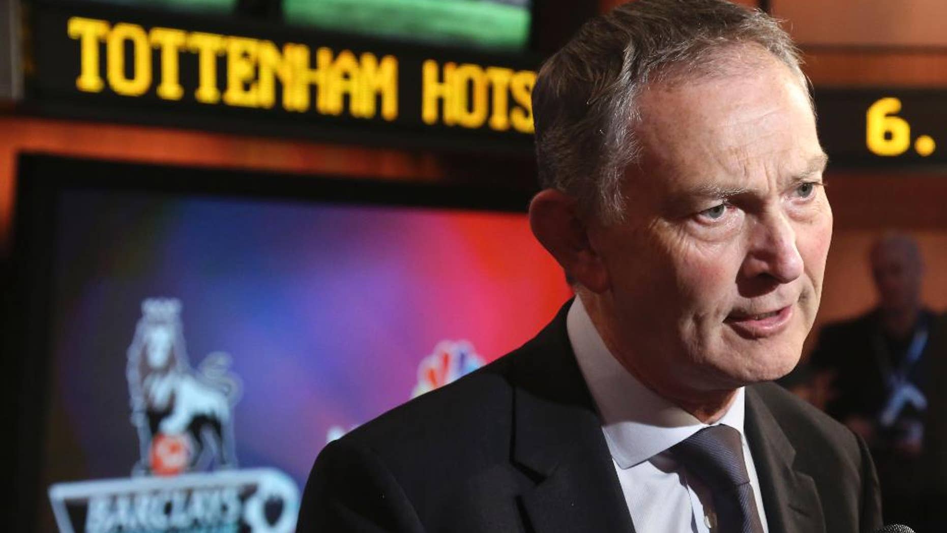 FILE - This is a Tuesday, April 16, 2013 file photo of Richard Scudamore, chief executive of the English Premier League, as he speaks during an interview at NBC studios in New York. At the expense of women, it's crystal clear why Premier League boss Richard Scudamore is often called the most powerful man in English football. Exchanging smutty, sexist emails with chums, provoking a wave of condemnation when they were published, wasn't enough to force his resignation or get him sacked. (AP Photo/Bebeto Matthews, File)