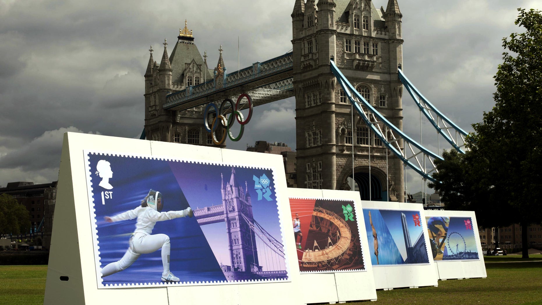 July 23, 2012: Enlarged images of Royal Mail's Welcome to the London 2012 Olympics stamps are displayed at Potters Fields, London .