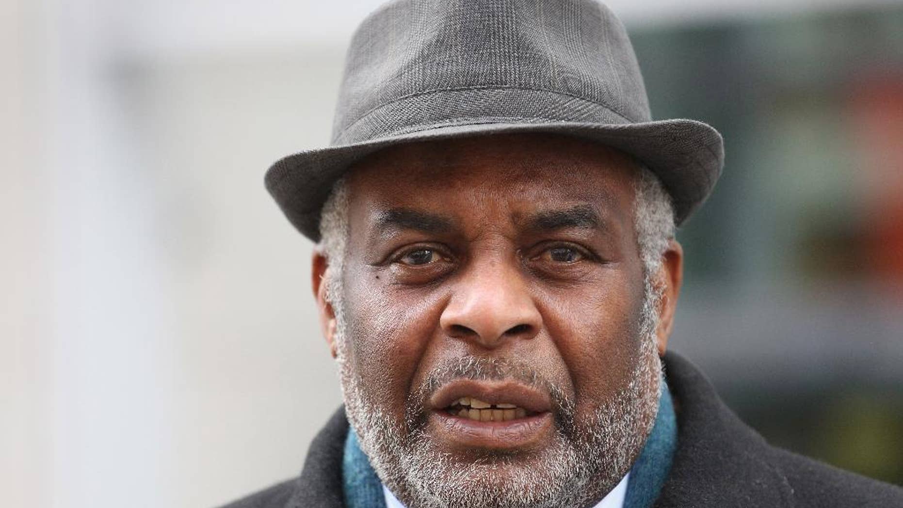 Neville Lawrence, father of Stephen Lawrence, speaks outside the Home Office in London, Thursday March 6, 2014, after meeting Home Secretary Theresa May. British officials on Thursday ordered an official inquiry into how undercover officers handled the 1993 stabbing of black teenager Stephen Lawrence, a racist murder that shocked the country and shook its faith in the police. The judge-led investigation, announced by Home Secretary Theresa May, follows the official confirmation by prominent lawyer Mark Ellison that an undercover officer had been dispatched to monitor Lawrence’s family, effectively acting as a police spy in the parents’ camp as they fought to expose official indifference to their son’s murder. (AP Photo/PA, Philip Toscano) UNITED KINGDOM OUT NO SALES NO ARCHIVE