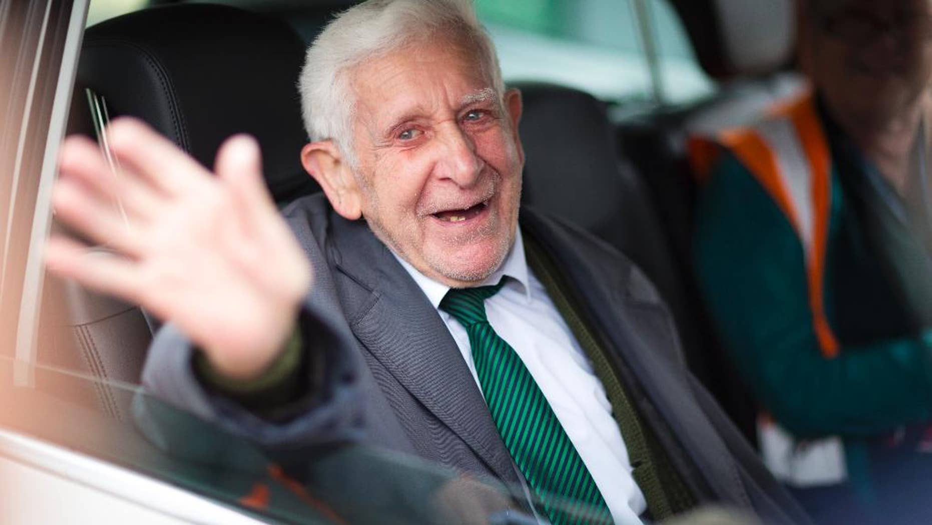 FILE - This is a June 7, 2014 file photo of Bernard Jordan, the war veteran found in Normandy after being reported missing from his care home. A British nursing home said an ex-naval officer who gained attention after vanishing from his care facility and taking an impromptu bus ride to France to attend D-Day commemorations has died. Bernard Jordan was 90. Gracewell Healthcare confirmed Jordan’s death on Tuesday Jan. 6, 2015. (AP Phto/Chris Ison/PA, File)