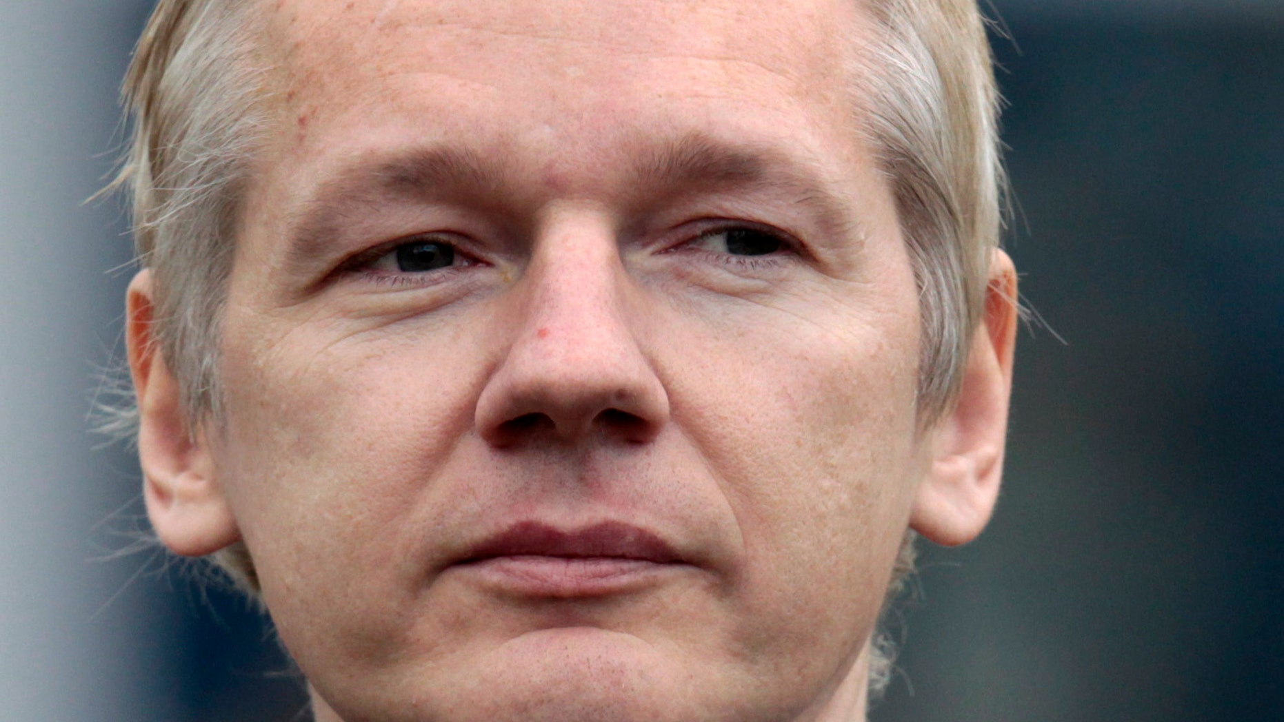 In this Jan. 11 file photo, the founder of WikiLeaks Julian Assange faces the media after making an appearance at Belmarsh Magistrates' Court in London. The New York Times is reporting that cables obtained by WikiLeaks reveal how the United States changed the way it dealt with Egypt after President Barack Obama came to power.