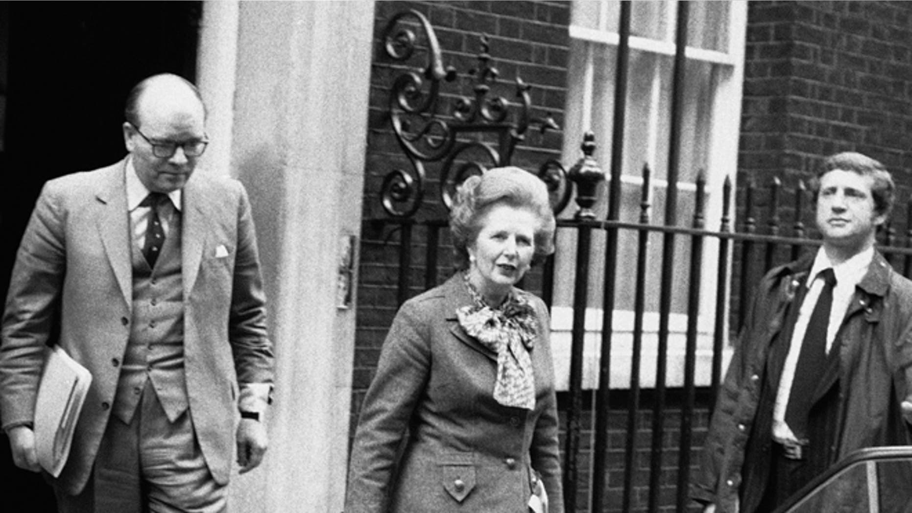 In this April 14, 1982 file photo, British Prime Minister Margaret Thatcher leaves her official 10 Downing Street residence in London, for an emergency session of Parliament on the Falklands crisis.