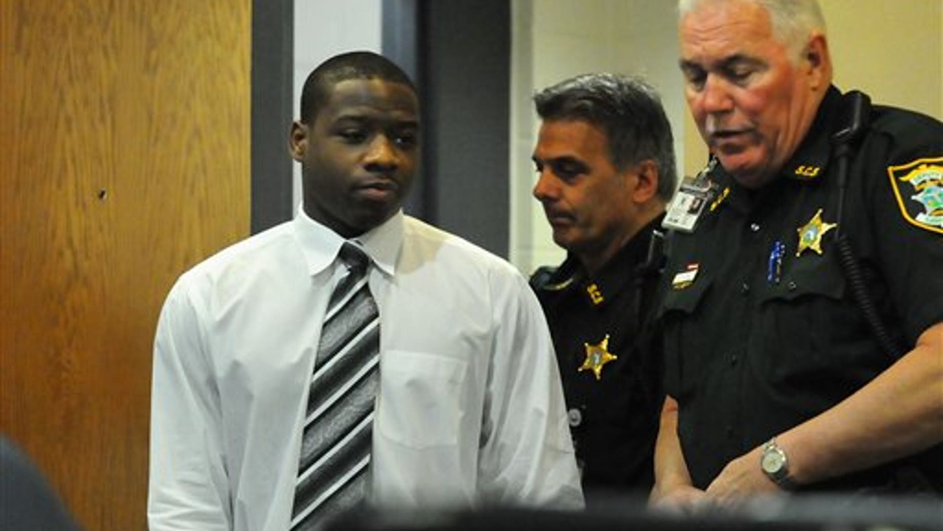 March 26: Shawn Tyson enters the court room on during the third day of his murder trial in Sarasota County Court in Sarasota, Fla.