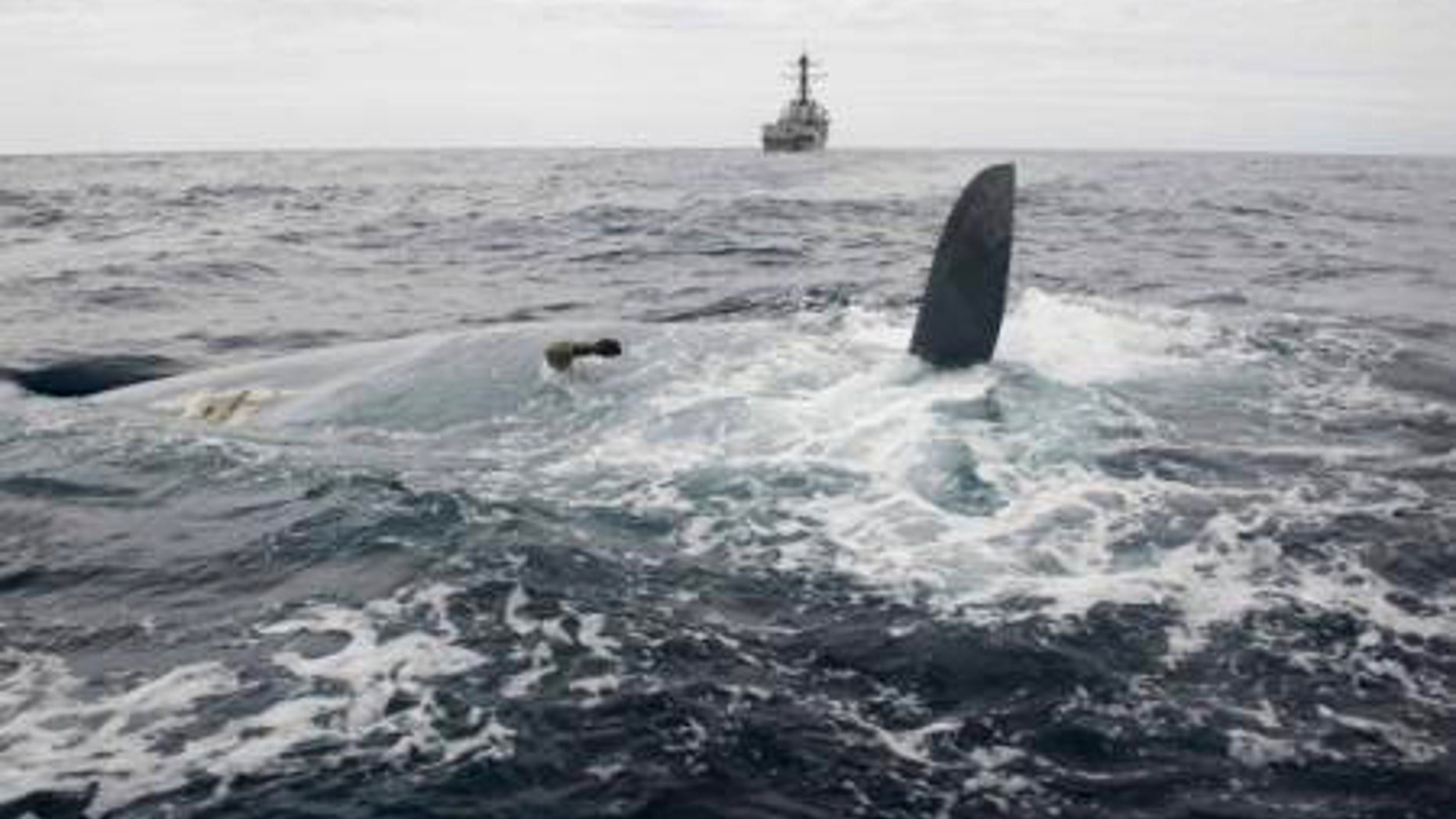 May 23, 2014: In this photo provided by the United States Navy, the overturned hull of the Cheeki Rafiki is shown as discovered by a U.S. Navy warship approximately 1,000 miles east of Cape Cod, Mass.