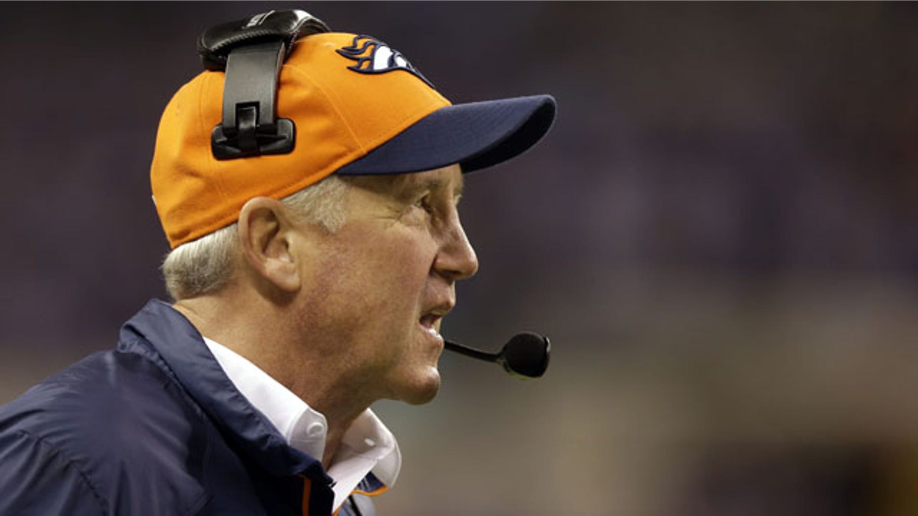 Denver Broncos head coach John Fox watches during the first half of an NFL football game against the Indianapolis Colts, Sunday, Oct. 20, 2013, in Indianapolis. (AP Photo/Michael Conroy)