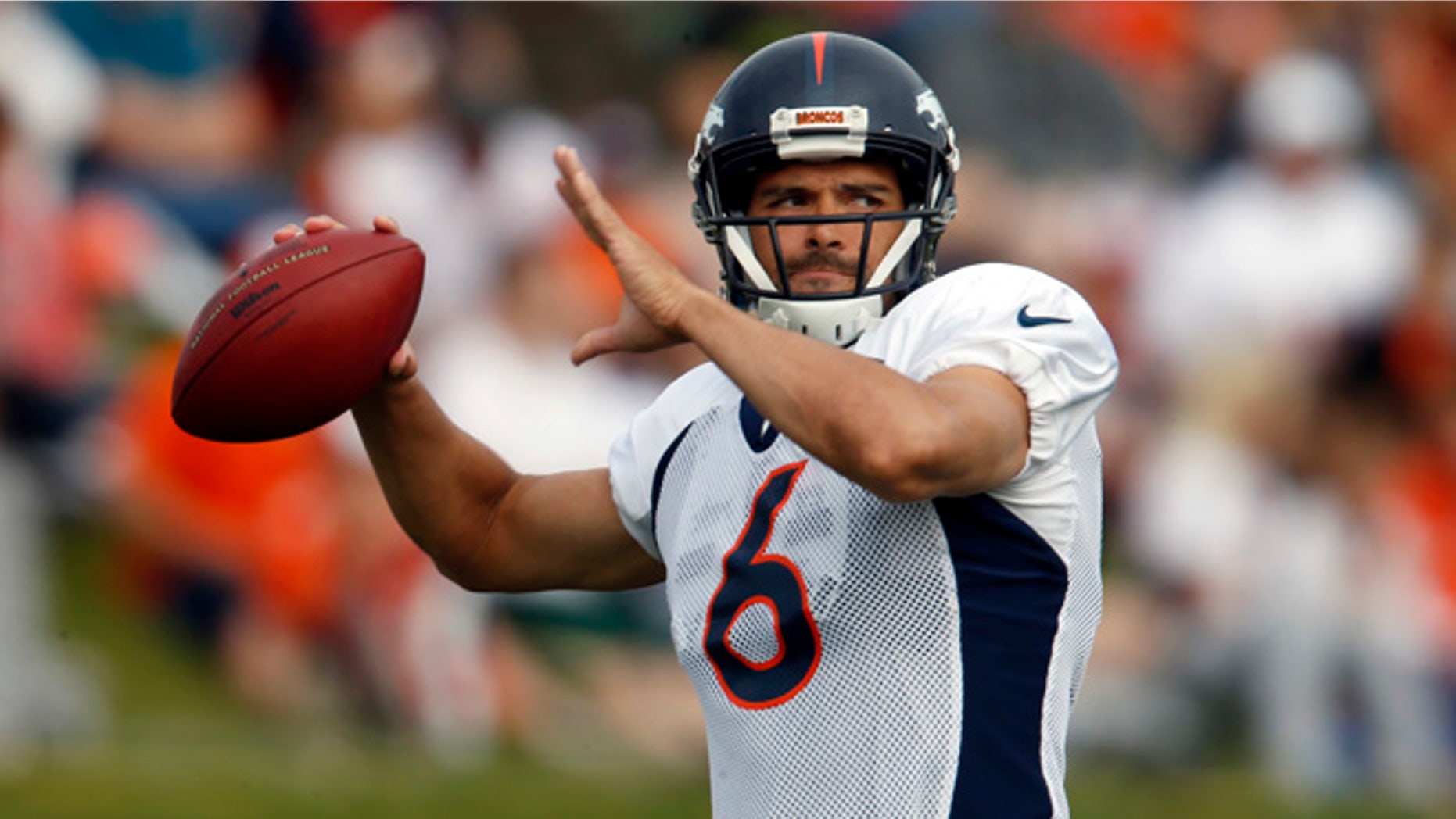 FILE - In this Thursday, Aug. 4, 2016, file photo, Denver Broncos quarterback Mark Sanchez throws a pass during NFL football training camp in Englewood, Colo. The Broncos announced Wednesday, Aug. 10, 2016, that Sanchez will be the starting quarterback for the preseason opener in Chicago on Thursday night. (AP Photo/David Zalubowski, File)