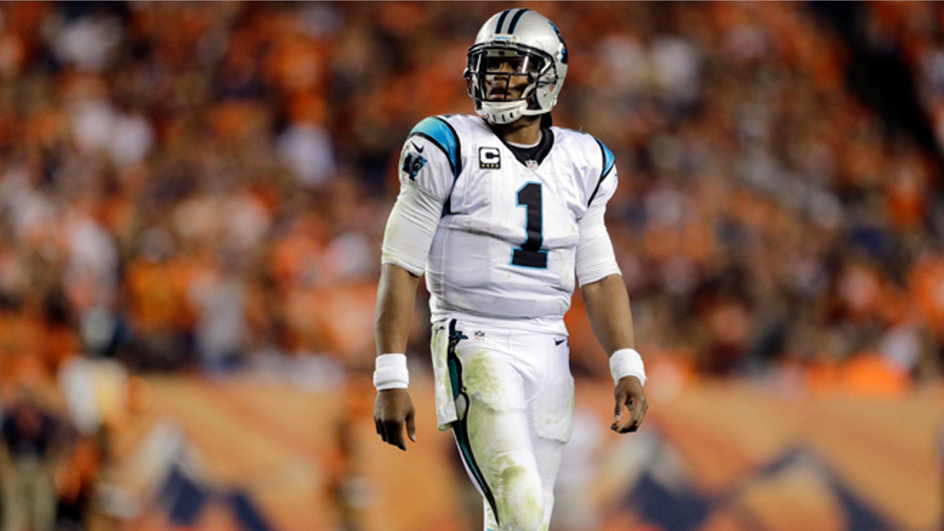 Carolina Panthers quarterback Cam Newton (1) walks to the sidelines during the second half of an NFL football game against the Denver Broncos, Thursday, Sept. 8, 2016, in Denver. (AP Photo/Joe Mahoney)