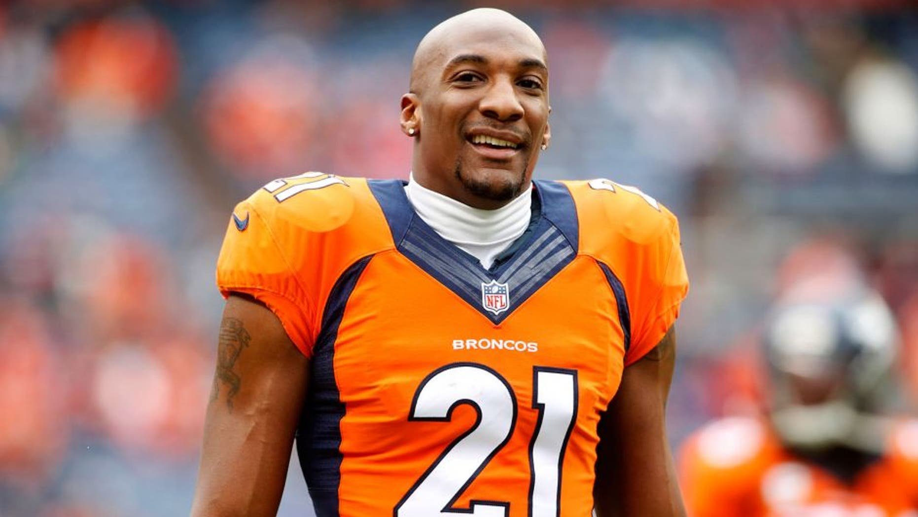 Nov 23, 2014; Denver, CO, USA; Denver Broncos cornerback Aqib Talib (21) before the game against the Miami Dolphins at Sports Authority Field at Mile High. Mandatory Credit: Chris Humphreys-USA TODAY Sports
