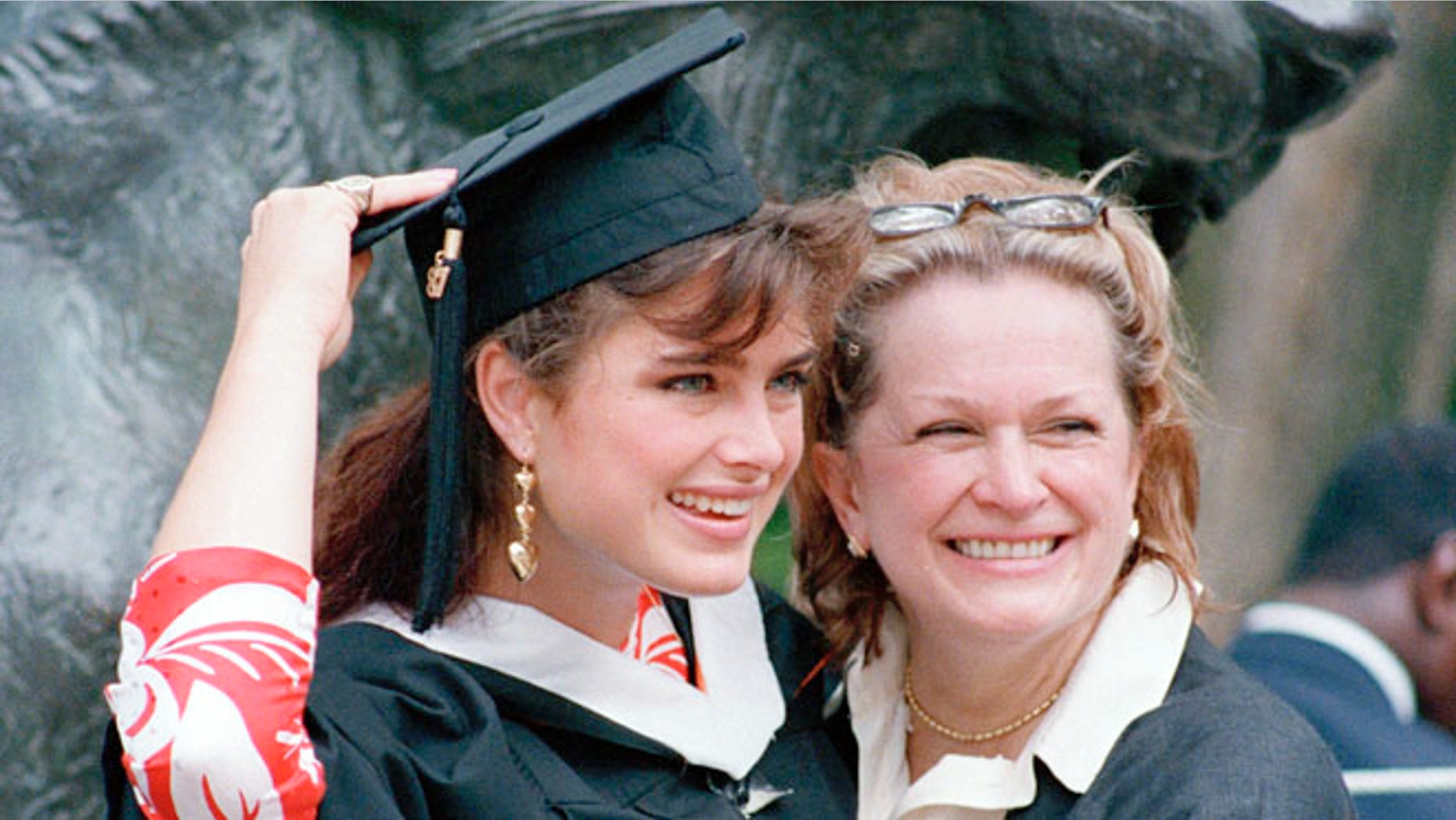 This June 9, 1987 file photo shows actress-model Brooke Shields with her mom Teri after graduation ceremonies at Princeton University in Princeton, N.J.