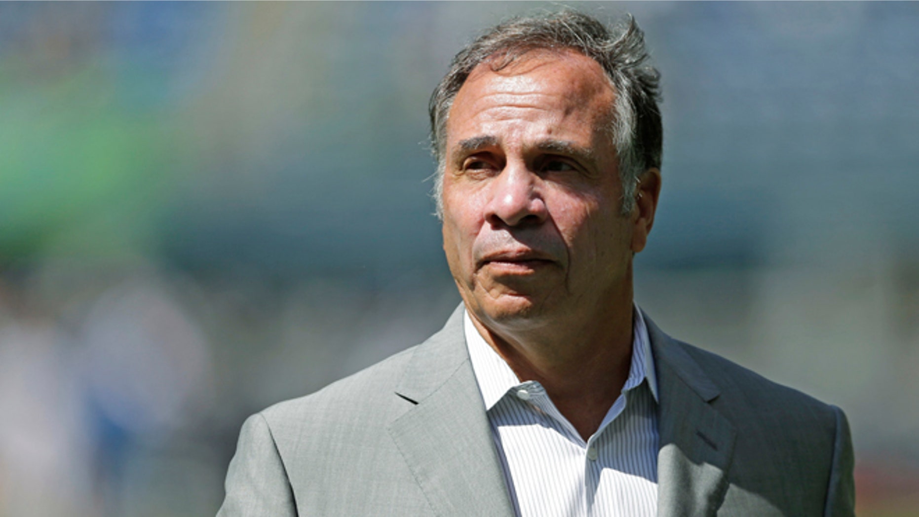 FILE - In this July 31, 2016, file photo, Los Angeles Galaxy Bruce Arena walks on the pitch following an MLS soccer match against the Seattle Sounders, in Seattle. Jurgen Klinsmann was fired as coach of the U.S. soccer team on Monday, Nov. 21, 2016, six days after a 4-0 loss at Costa Rica dropped the Americans to 0-2 in the final round of World Cup qualifying. LA Galaxy coach Bruce Arena is the favorite to succeed Klinsmann. (AP Photo/Ted S. Warren, File)