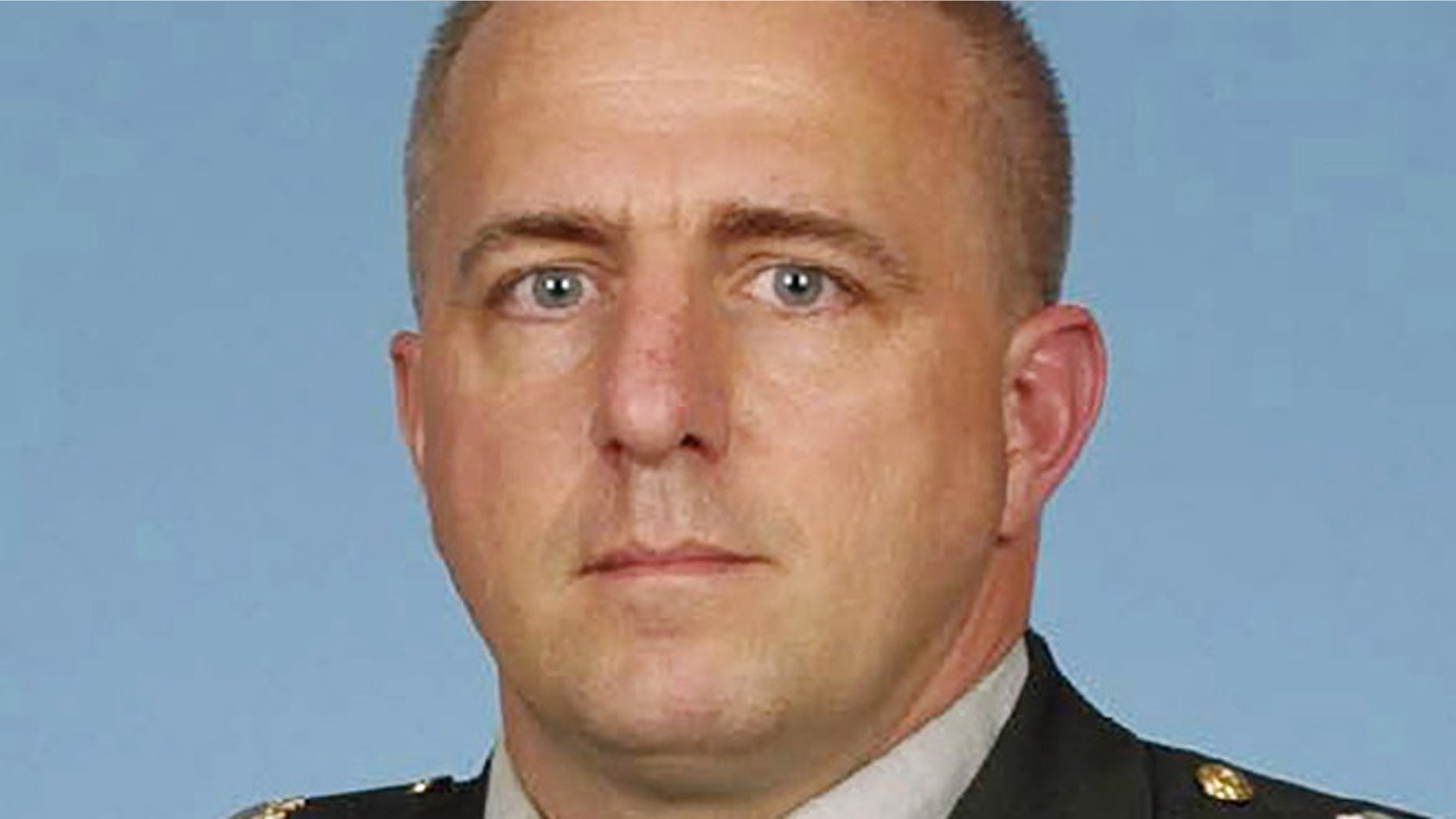 This undated photo provided by the U.S. Army shows Capt. Bruce Kevin Clark. The family Clark, a Texas-based Army medic serving in Afghanistan, says Clark's wife witnessed the officer's death, which happened Monday, April 30, 2012 as the two were video chatting via Skype.