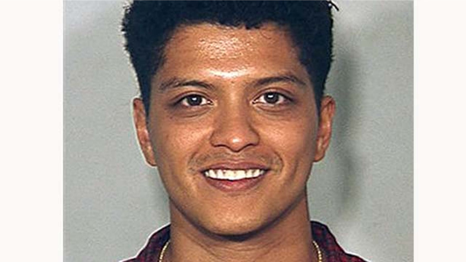 FILE - This Sept. 19, 2010 file image provided by the Las Vegas Metro Police Dept., shows singer Bruno Mars in a booking photo at the Clark County Detention Center in Las Vegas. Mars agreed Friday Jan. 28, 2011 to a plea deal that would get him a fine, probation and eventual dismissal of a felony cocaine possession charge.(AP Photo/Las Vegas Metro Police Department, File)