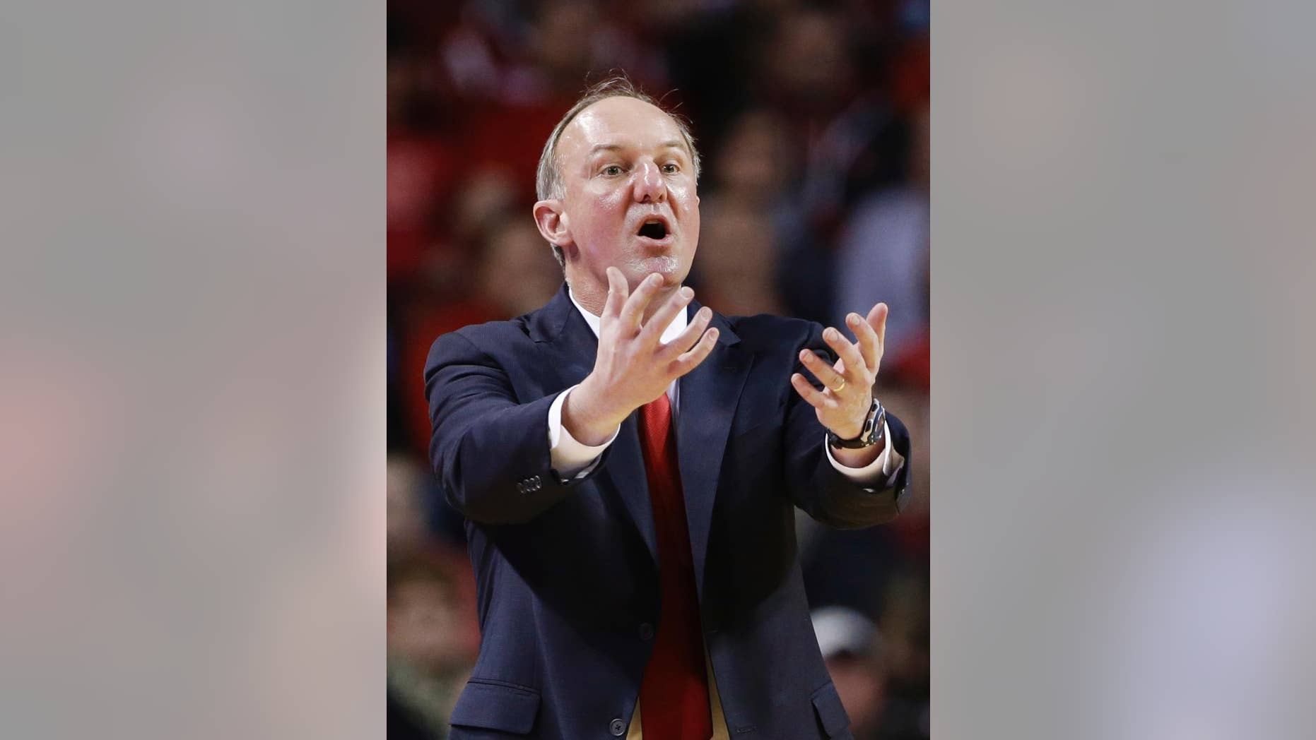 FILE - In this Jan. 20, 2014, file photo, Ohio State coach Thad Matta calls instructions in the first half of an NCAA college basketball game against Nebraska in Lincoln, Neb. There’s not a lot of talk about the latest version of the Ohio State’s men’s basketball team as it begins preseason practice. About all anyone would know for certain about coach Thad Matta’s 11th Buckeyes squad is who is not on it: point guard Aaron Craft and leading-scorer LaQuinton Ross. (AP Photo/Nati Harnik, File)